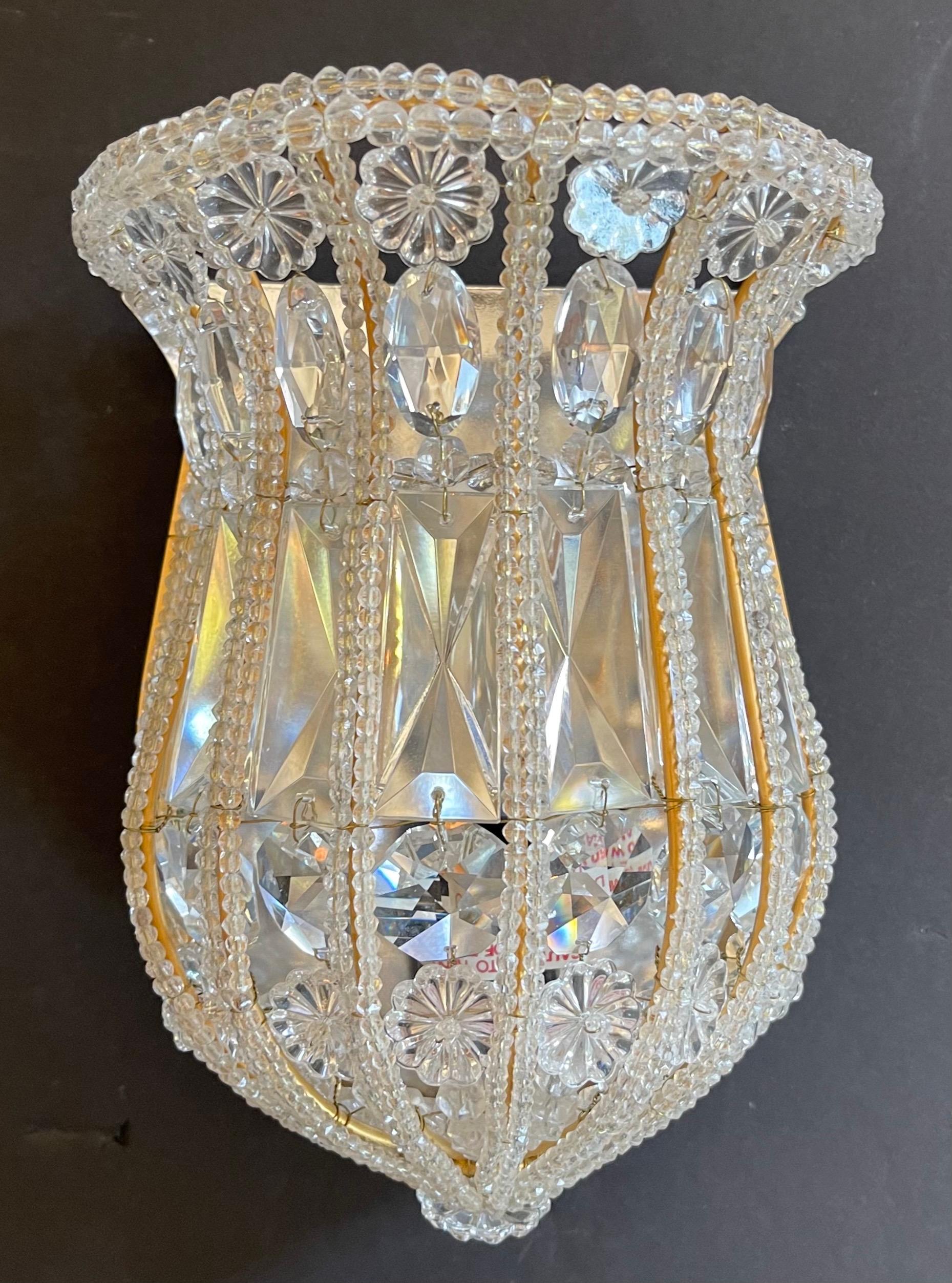 A wonderful vintage pair Of Sherle Wagner French gold gilt & crystal bead basket form single edison light sconces wall fixtures.