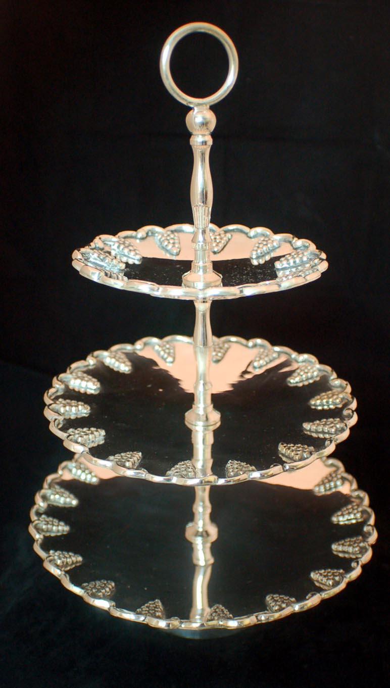This is an exquisite pair of silver plated cake stands, dating from the late 20th century.

There is no mistaking their high quality and individual design, which is certain to make them a talking point at your table.

The stands feature three
