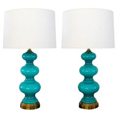 Coppia di lampade d'epoca a tre zucche in vetro incamiciato color verde acqua