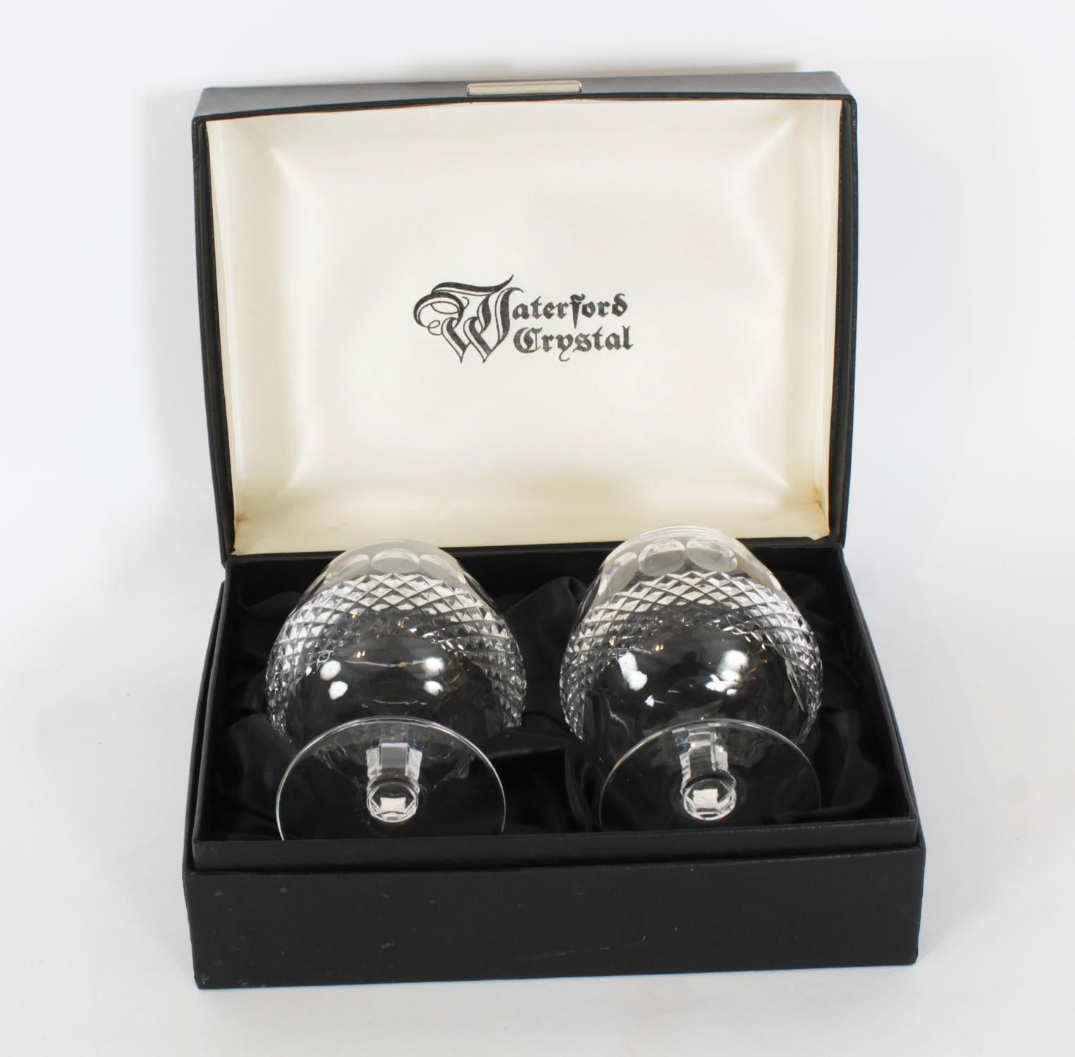 This is a splendid  Vintage pair of Waterford cut crystal brandy glasses, in their original box, dating from the second half of the 20th Century

It is a highly decorative cut crystal as the distinctive Waterford cut gives it a lovely