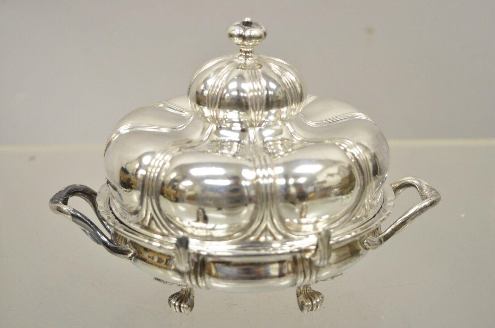 Vintage pairpoint silver plated covered butter bowl covered dish with glass.
Item features a 