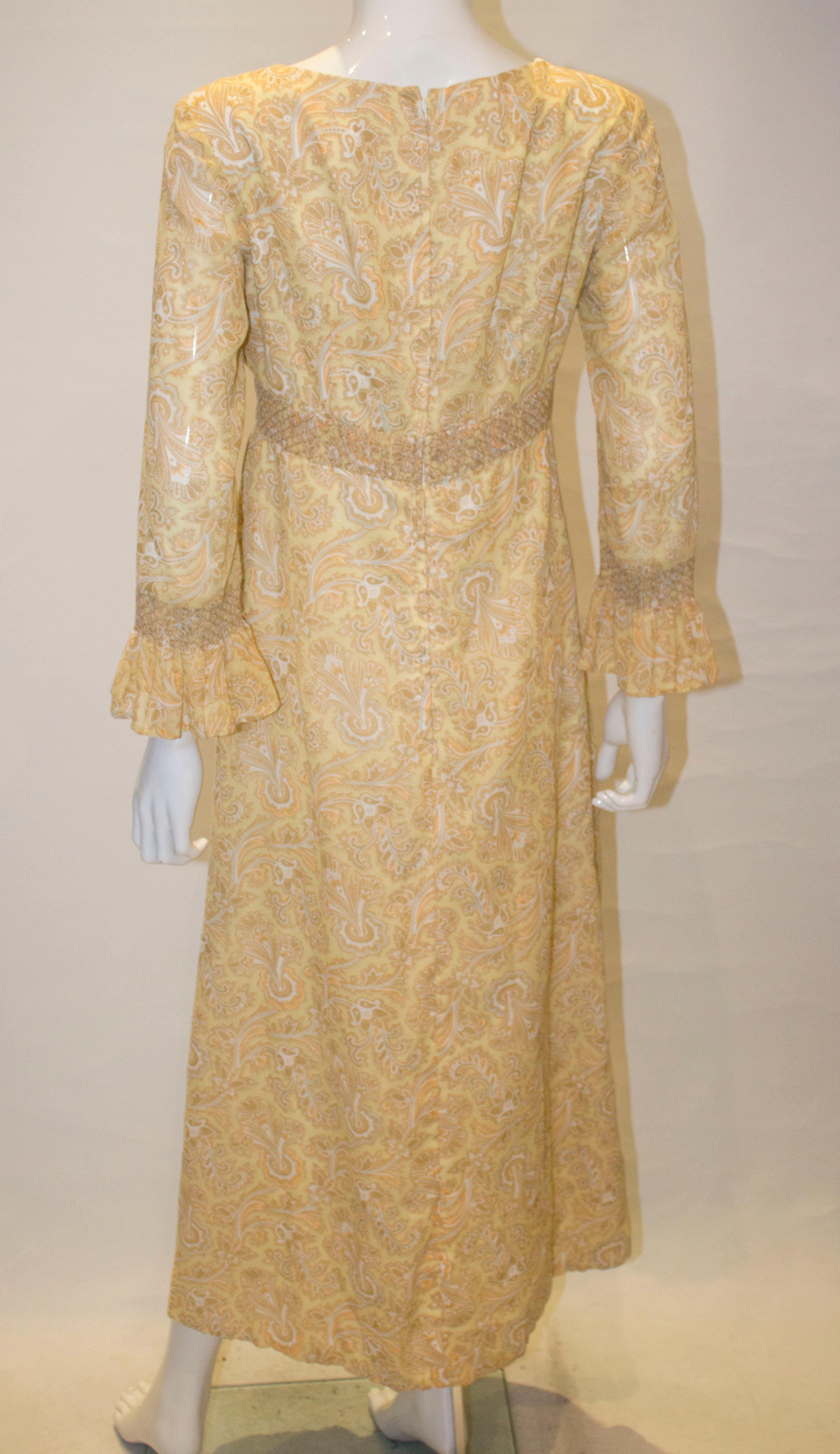Brown Vintage Paisley Print Gown With Smocking Detail For Sale