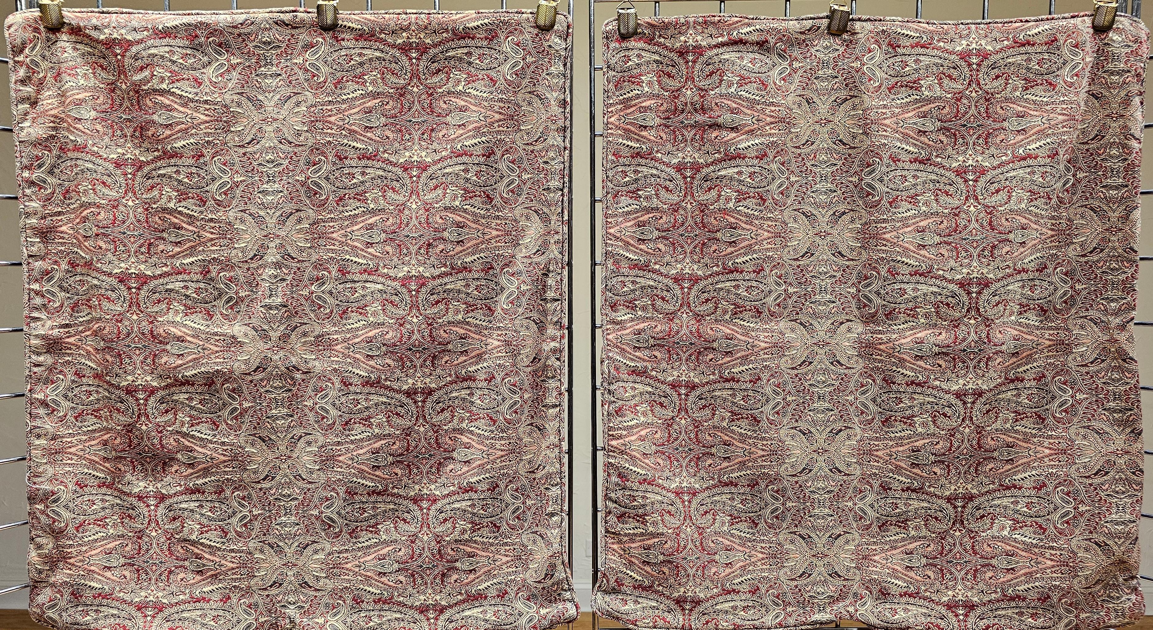 A pair of handwoven Paisley Shawl Pillow Cases (floor cushions) from the early 20th century.  The Paisley Shawls became very popular during the reign of Queen Victoria in the mid-1800s.
Dimensions:  25” x 29” X .5