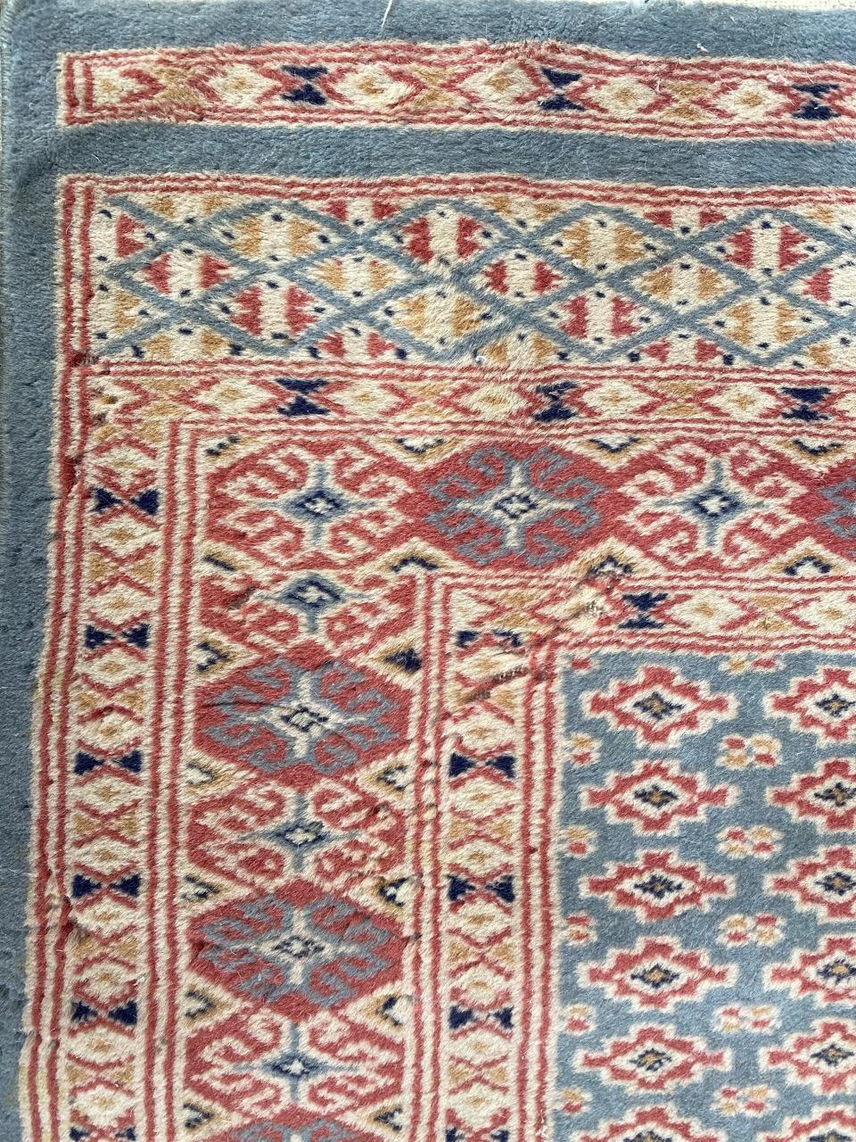 Little vintage Pakistani runner with beautiful decorative design and nice colors, entirely hand knotted with wool velvet on cotton foundation.