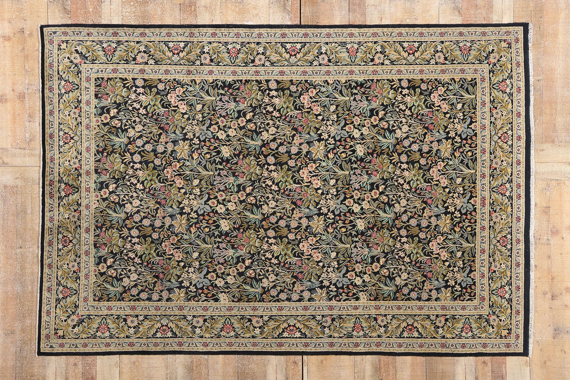 79224 Vintage Pakistani Tabriz Rug, 06'01 x 09'00. Woven in the fertile crossroads of artistic revival and timeless tradition, this hand-knotted wool vintage Pakistani Tabriz rug blossoms with the intricate lyricism of a millefleur garden captured