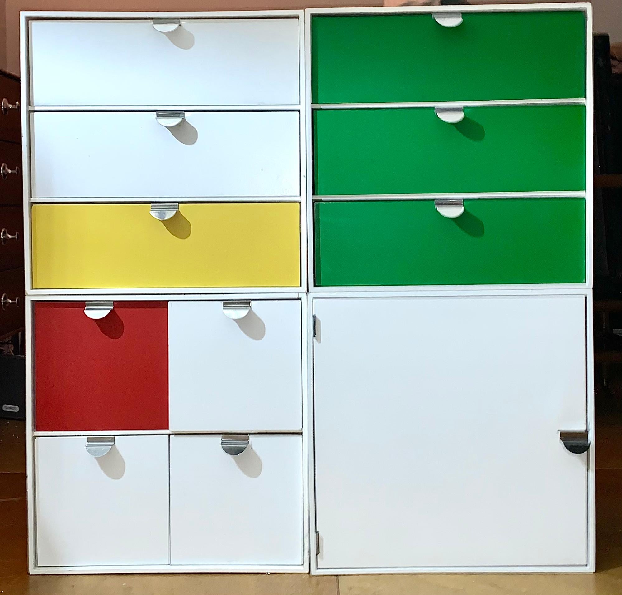 Vintage Palaset Palanox modular storage box set of 4, Red, Green, White, Yellow, Finland, 1972

Palaset Palanox, multicolored stackable boxes that allow you to build your own shelf, only produced for a few years in the early 1970s. During his