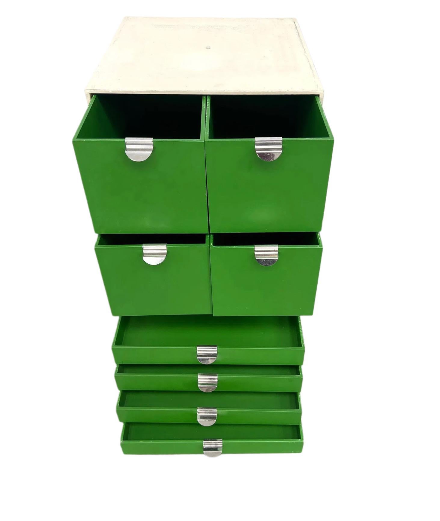 Vintage Palaset Palanox modular storage box set of 7, White, Finland, 1972.  This set includes 2 white open boxes, 1 white 3-part box, 1 white 2-part box, 1 6-part white box,  2 white boxes with doors, 3 green drawers,  4 quarter-size green drawers