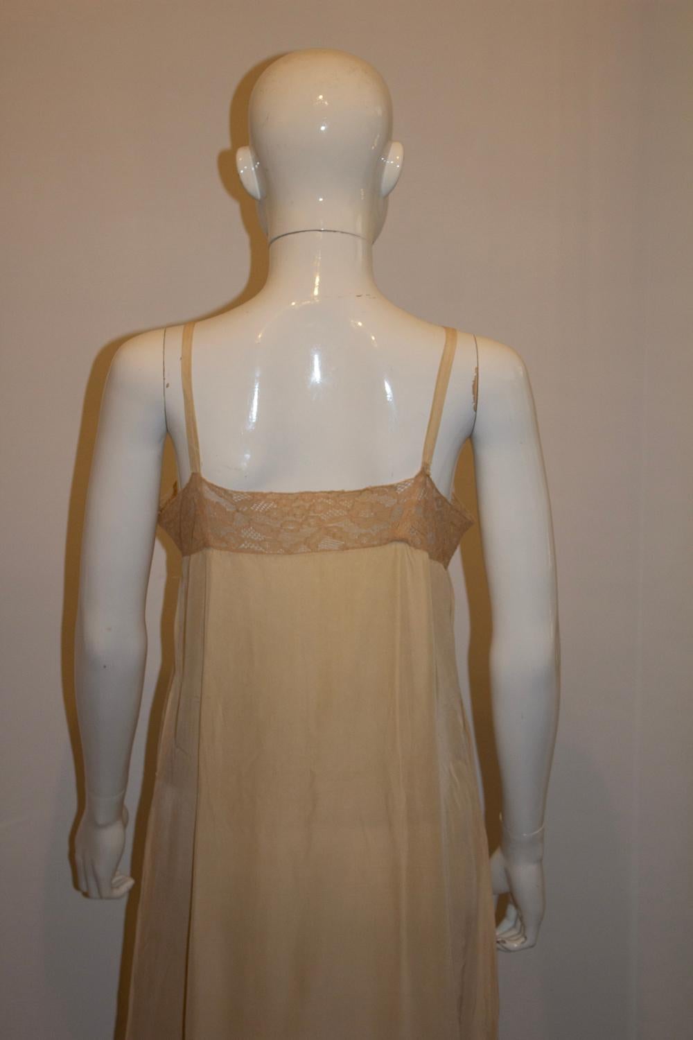 Women's or Men's Vintage Pale Coffee Colour Silk Slip with Beautiful Lace detail For Sale