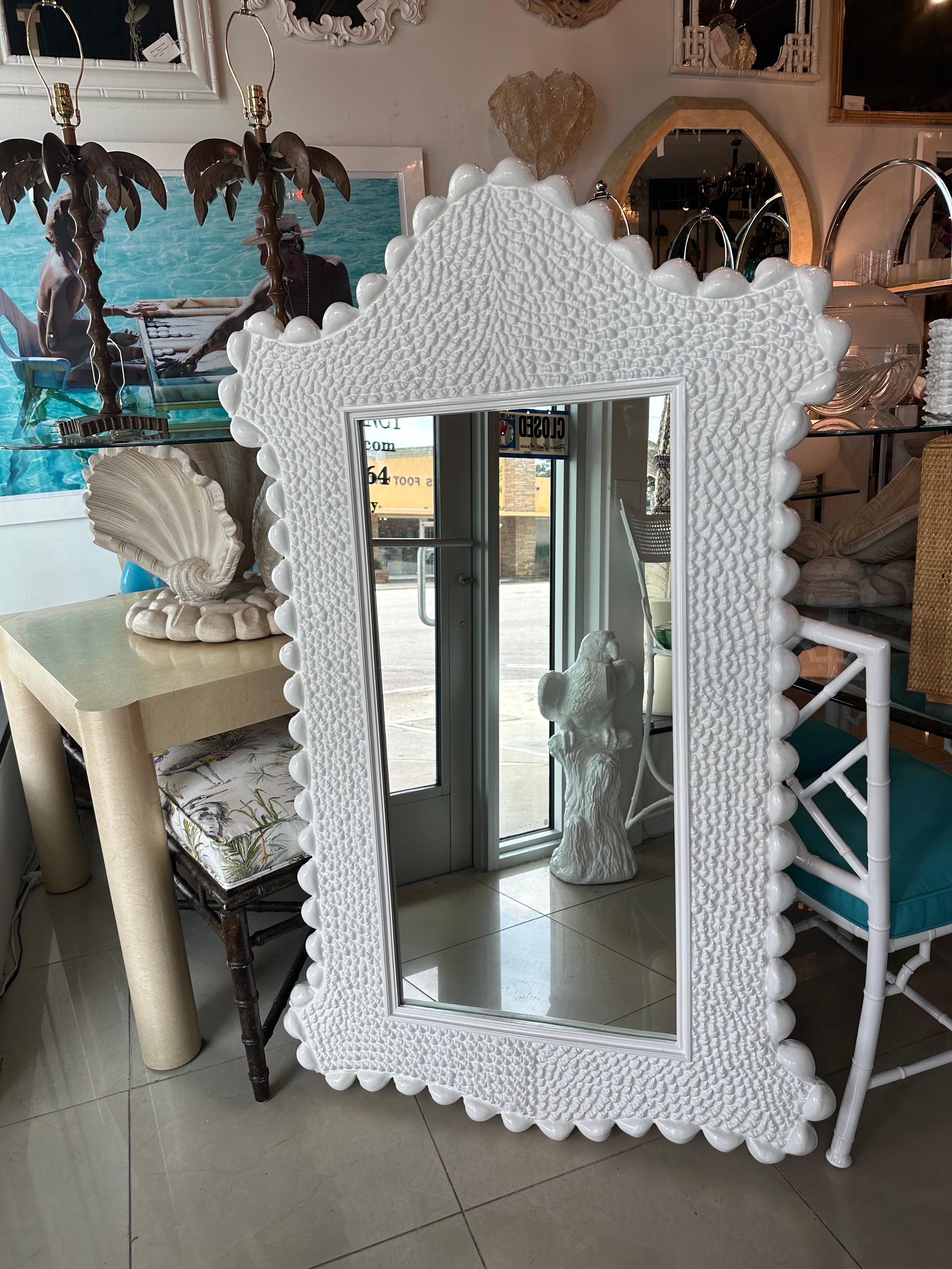 Amazing vintage faux carved composite shell seashell wall mirror. Newly lacquered in white. Comes ready to hang. Dimensions: 62 H x 38 W X 2 D.