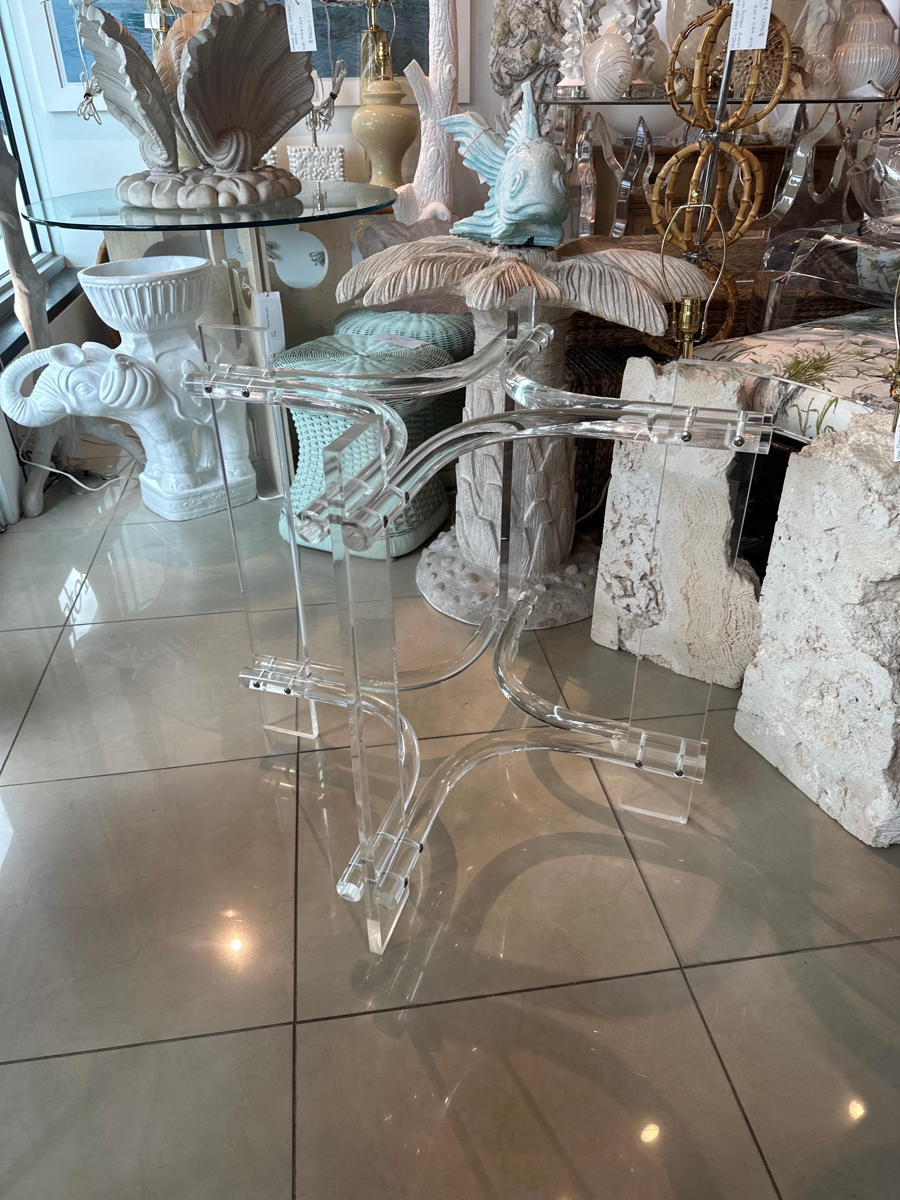 Vintage lucite table base. This can be used as a dining table base, game table base or a center/entry table base. You can add your top of glass, marble, wood, etc. This has been polished, There is a small chip and inclusion on the bottom of the leg