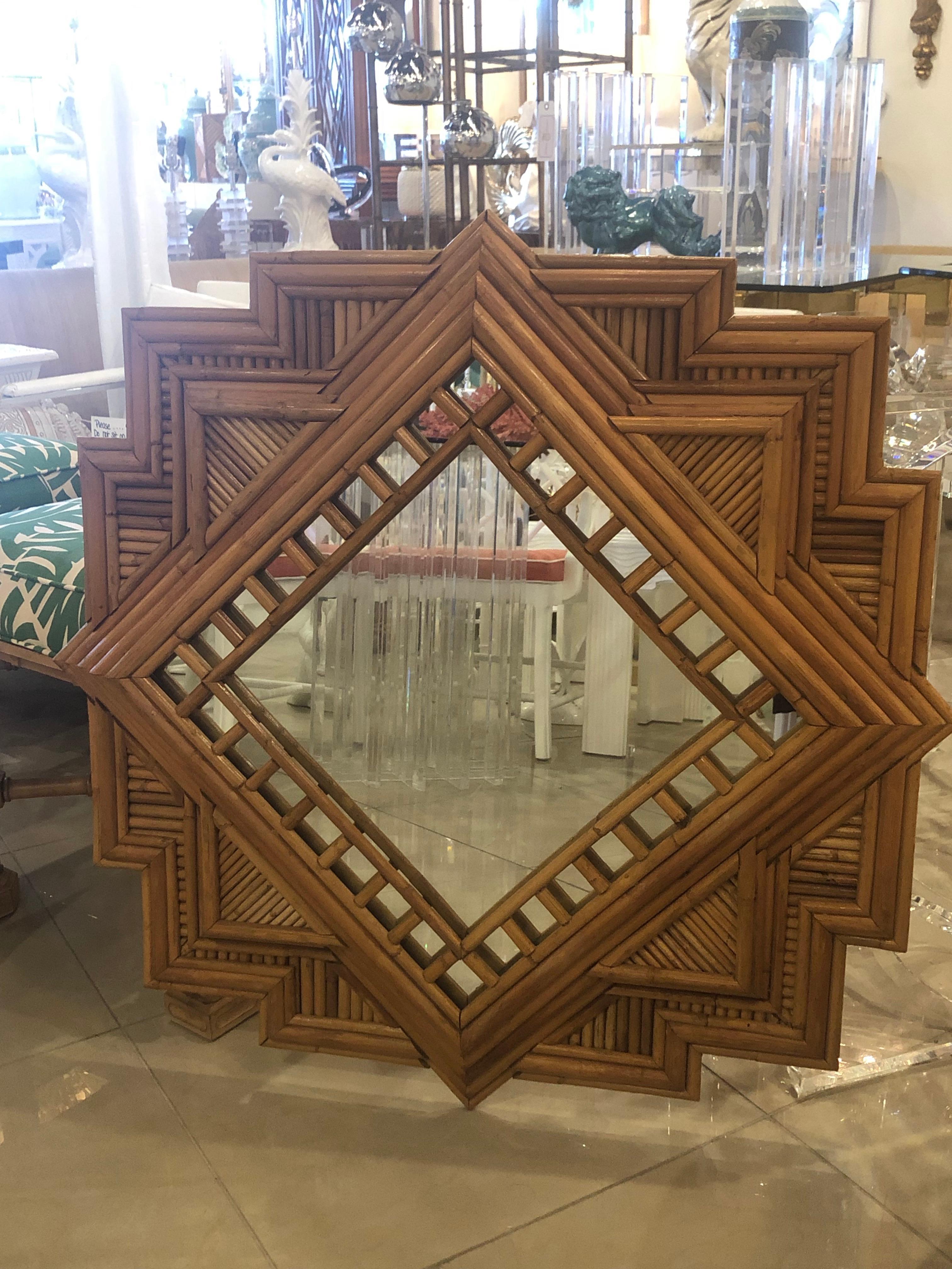 Amazing vintage pencil reed bamboo wall mirror. Comes ready to hang on your wall.