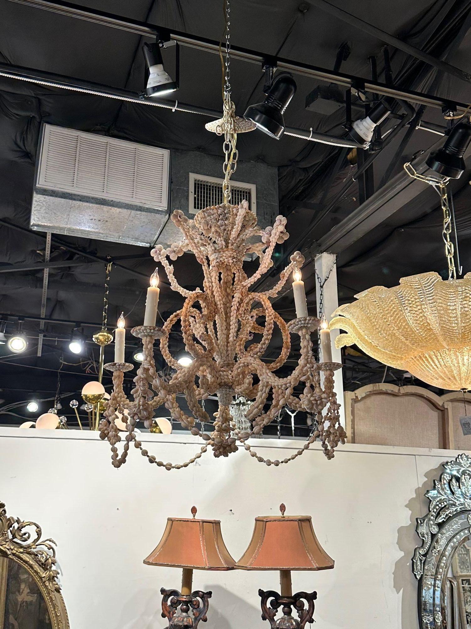 Vintage Palm Beach seashell 5-light chandelier. Circa 1980. The chandelier has been professionally re-wired, cleaned and is ready to hang. Includes matching chain and canopy.