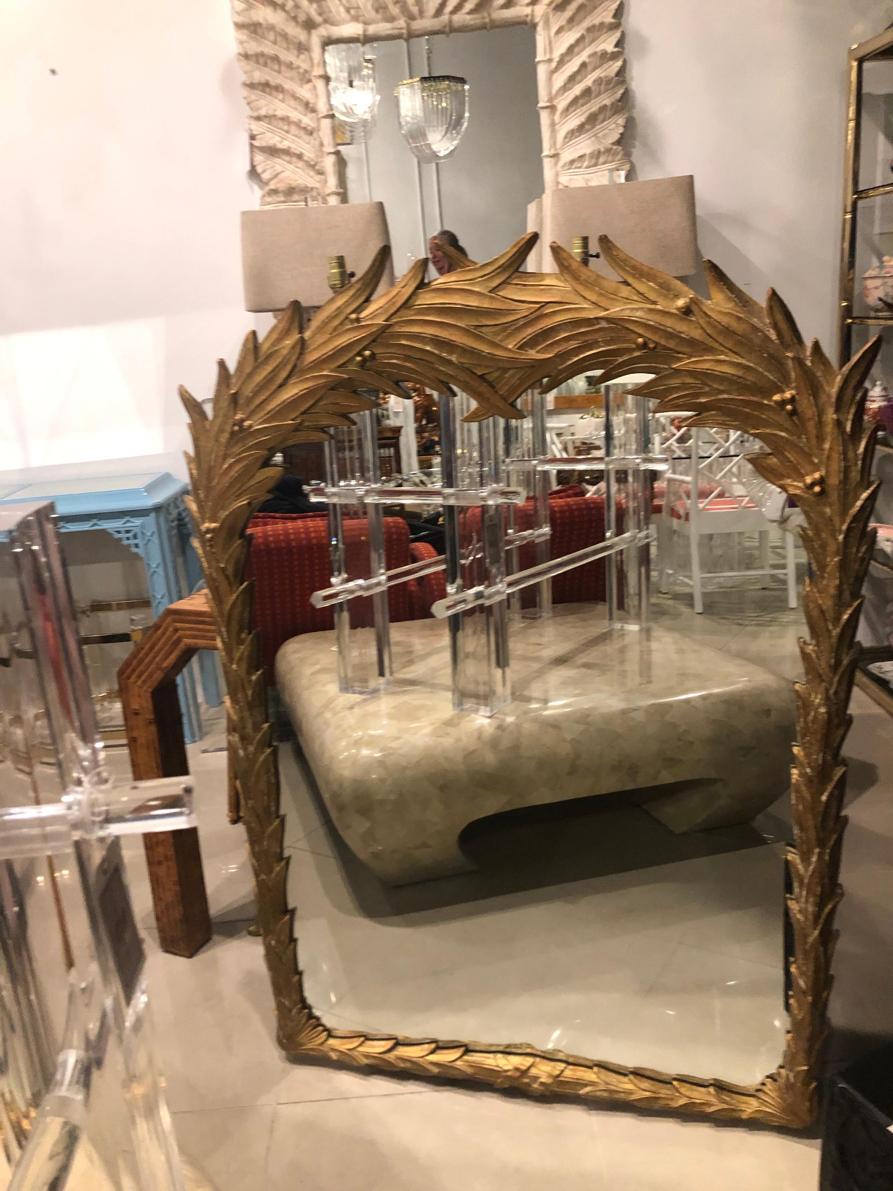 Vintage palm frond leaf leaves wall mirror. In the manner of Serge Roche. Great tropical, Palm Beach style. Original gold finish. Can be lacquered in color of choice for additional charge.
