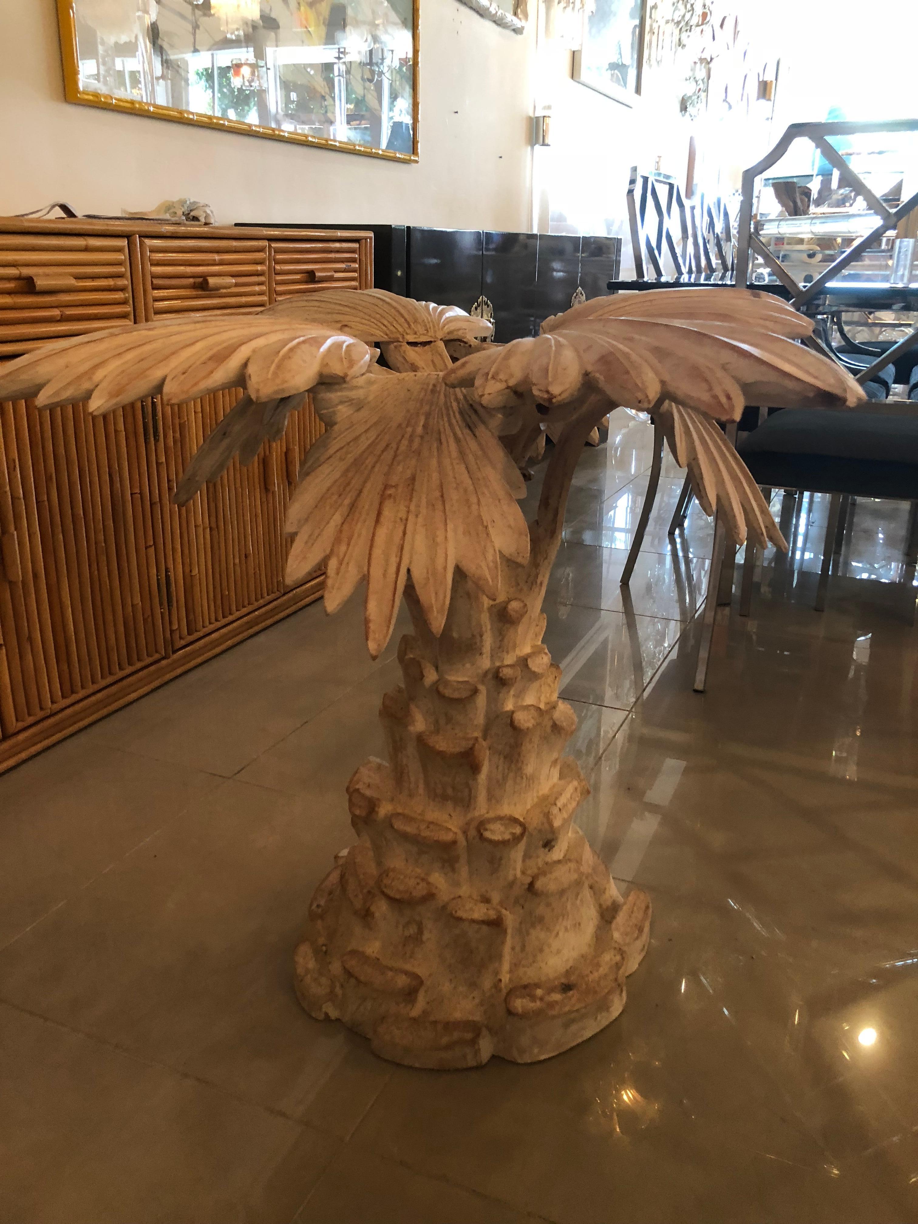 The most amazing vintage palm tree frond leaf table base. This can be used as a game table, dining table, or entry table. A piece of glass would go on top of it. I recommend square, round, or octagonal. The piece is carved wood, stamped on bottom
