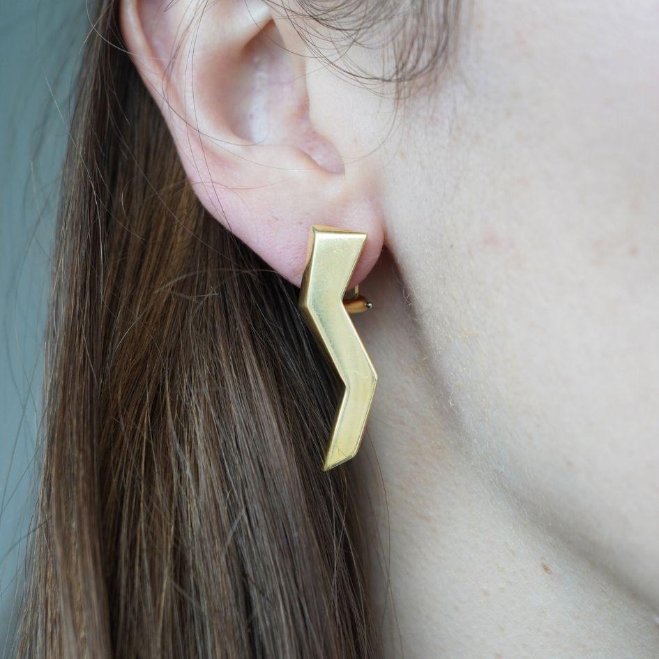 These vintage Tiffany & Co. Paloma Picasso earrings date circa 1985. Crafted in 18k yellow gold, the earrings feature a bold, angular zig-zag silhouette, a signature design element frequently seen in Picasso’s work. The earrings measure