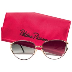 Vintage Paloma Picasso Gafas de sol doradas con detalles triangulares Made in Germany Años 80