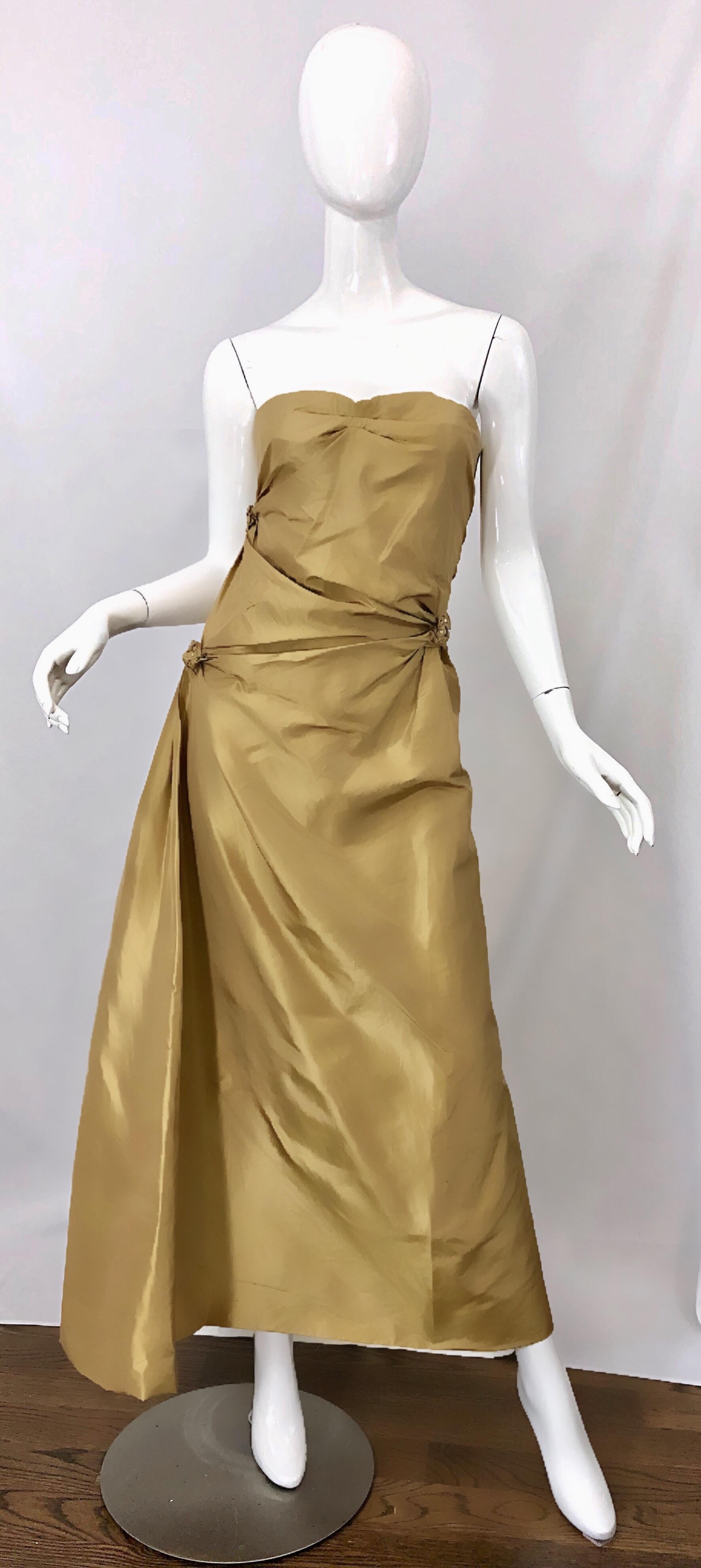Incredible vintage 1990s PAMELA DENNIS COUTURE muted gold silk taffeta strapless beaded evening gown! Features a strapless interior boned bodice with interior support. Fabulous gathers and drapes throughout with beaded and sequin adorned silk
