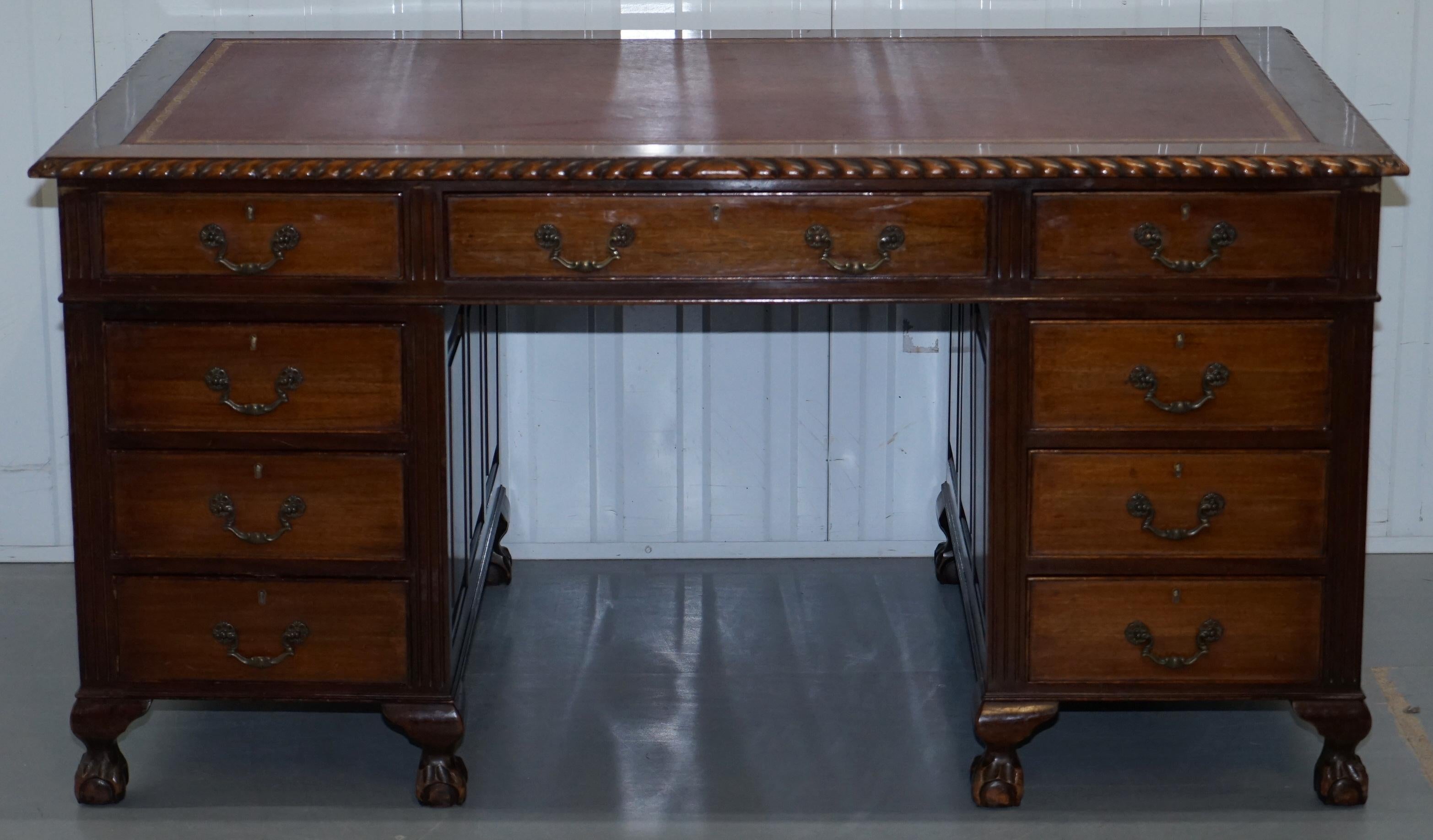 We are delighted to offer for sale this lovely Claw & Ball foot twin pedestal partner desk with oxblood leather top and panelled mahogany frame,

A very well made piece, the desk is panelled mahogany all around in the Georgian manor, it has hand