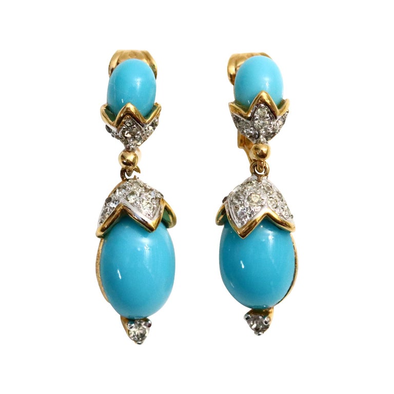 Vintage Panetta Faux Turquoise Dangling Earrings Circa 1980s. These small and delicate earrings have the look of fine the way they present.  They are shown in gold metal with diamante and the two dangling pieces of faux turquoise.  Always in style