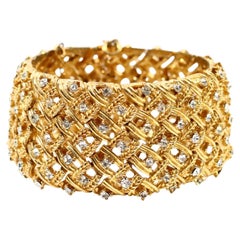 Pulsera ancha Panetta vintage en tono dorado con piedras redondas Circa 1960s