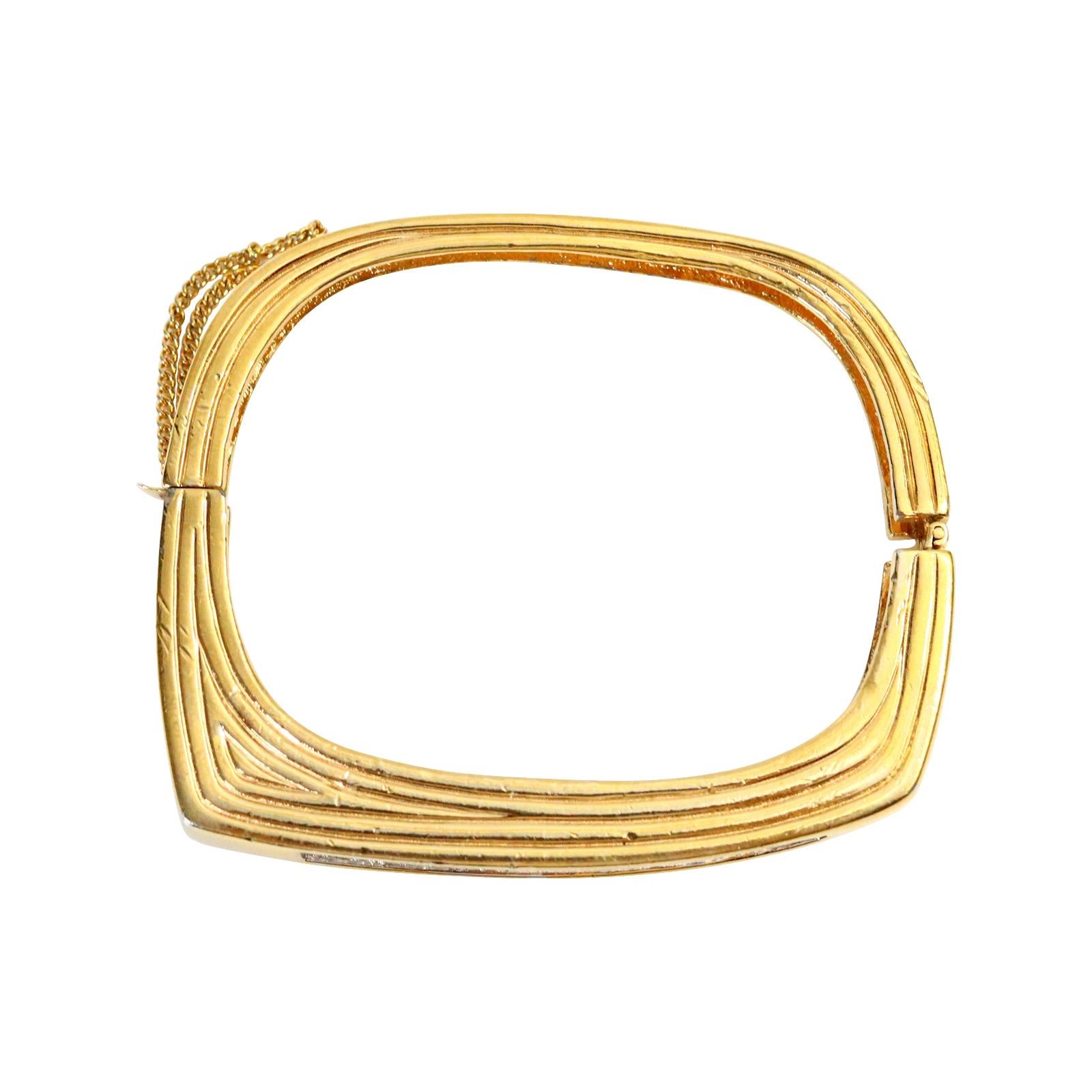 Vintage Panetta Gold Diamante Bracelet Circa 1970s.  The outside is square with inset pave stones while the inside is an oval so it will be comfortable to wear. The Style is so well made that it does resemble fine though as a famous designer from