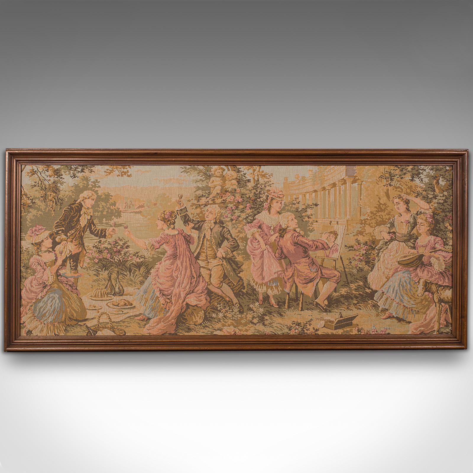 This is a vintage panoramic tapestry. A Continental, needlepoint display panel with mahogany frame, dating to the early 20th century, circa 1930.

Generous proportion, presenting a classical scene
Displays a desirable aged patina