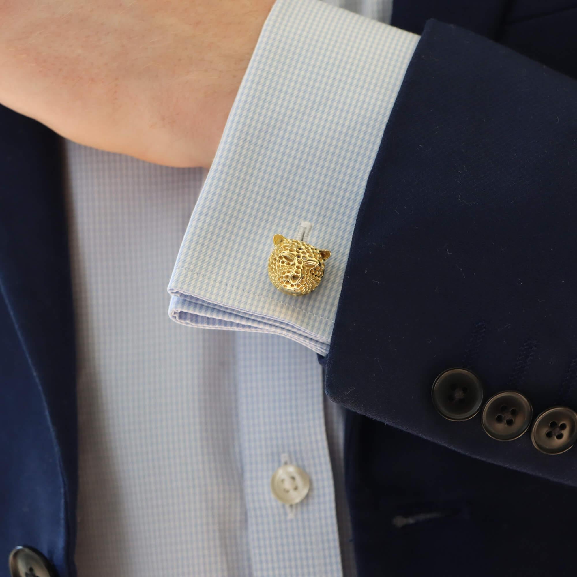  An interesting pair of vintage panther head swivel back cufflinks set in platinum and gold.

Each cufflink is comprised of a platinum but yellow gold-plated open work leopard head. The leopards are secured the reverse with an easy to use 9k swivel