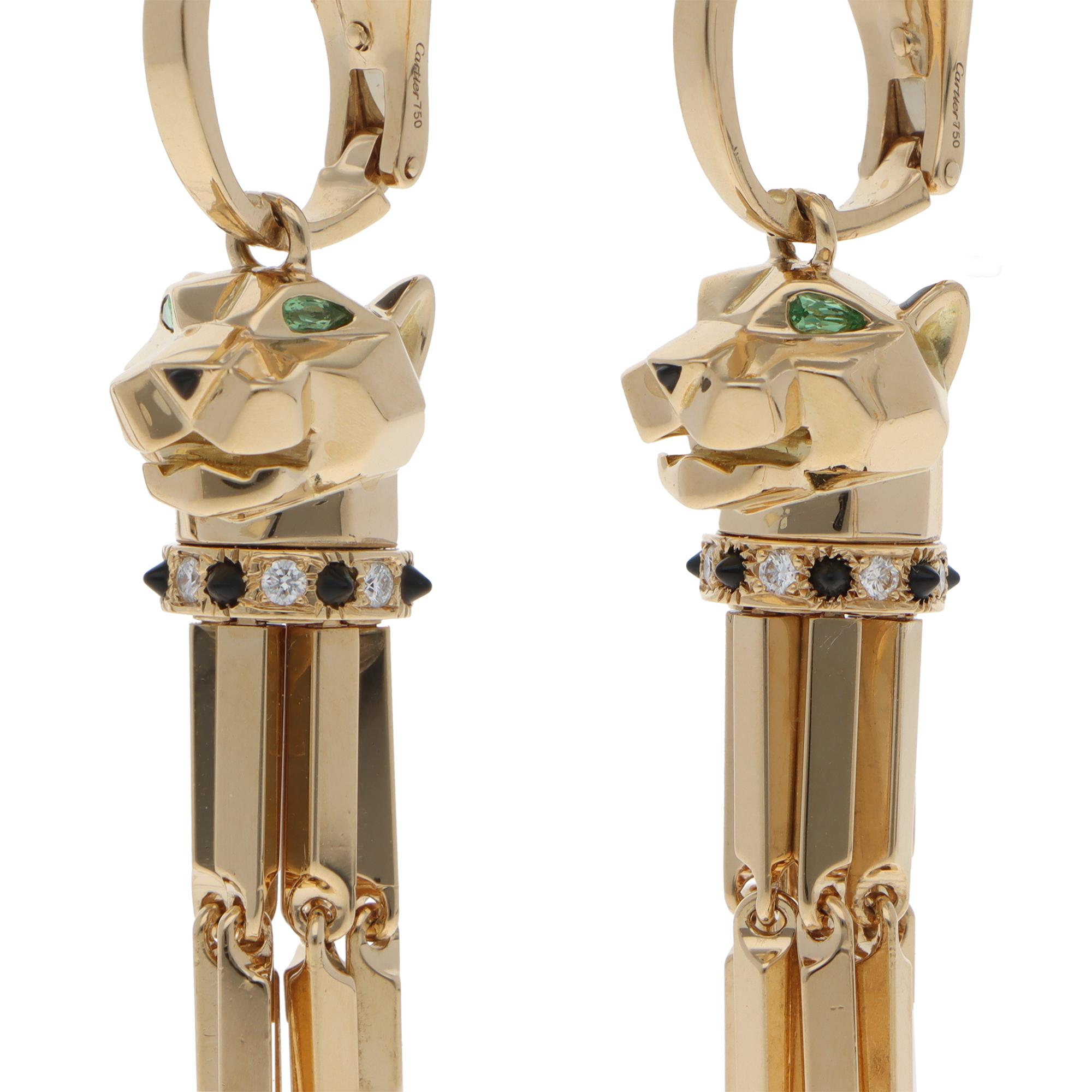 Eine schöne Vintage Cartier Panthère de Cartier Ohrringe in 18k Gelbgold gesetzt.

Die Ohrringe aus der begehrten Kollektion von Cartier zeigen das ikonische Panther-Motiv von Cartier und sind aus massivem 18-karätigem Gelbgold gefertigt. Der