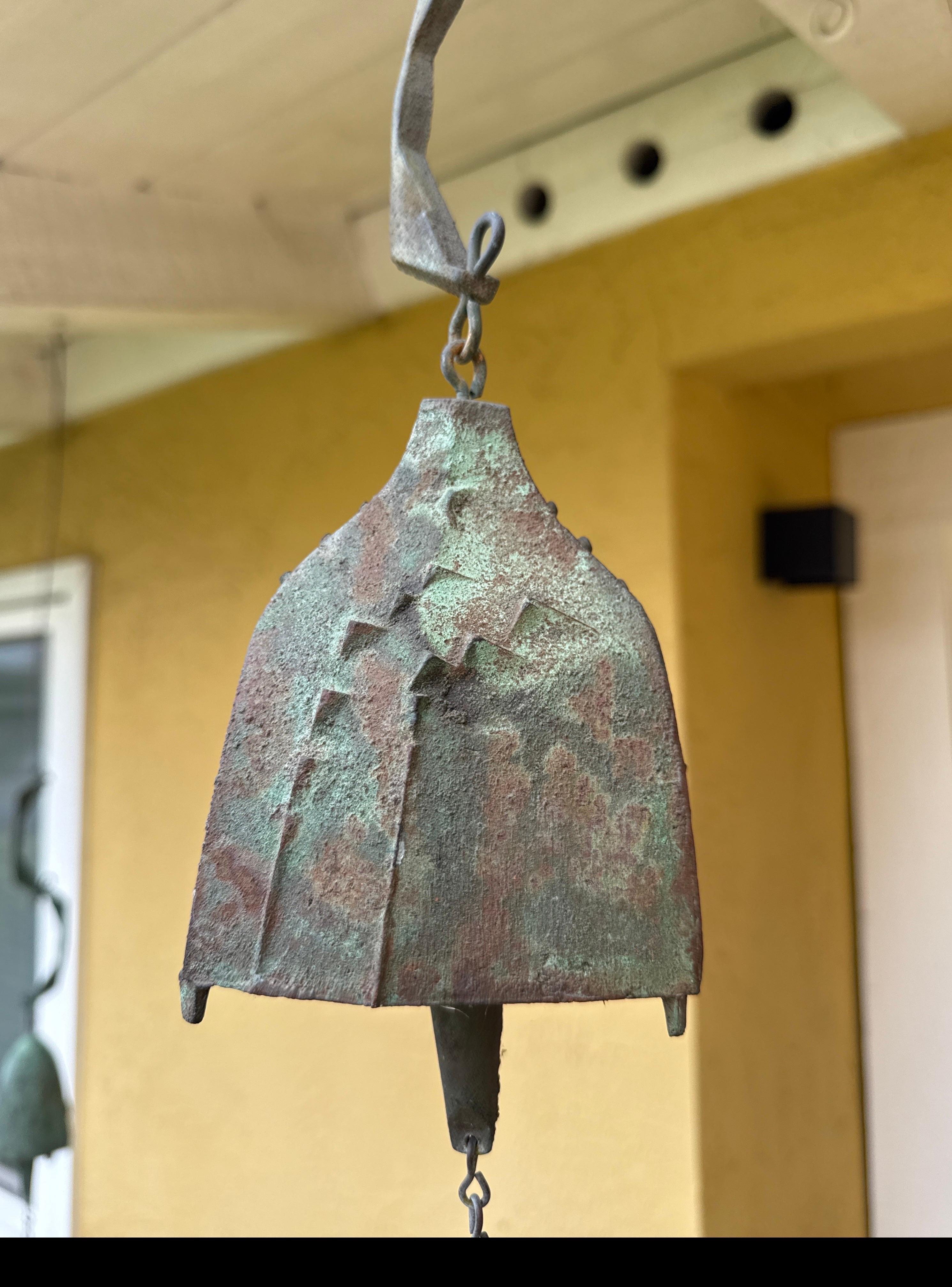 This is a fantastic cast bronze bell by Paolo Soleri. The body measures 4