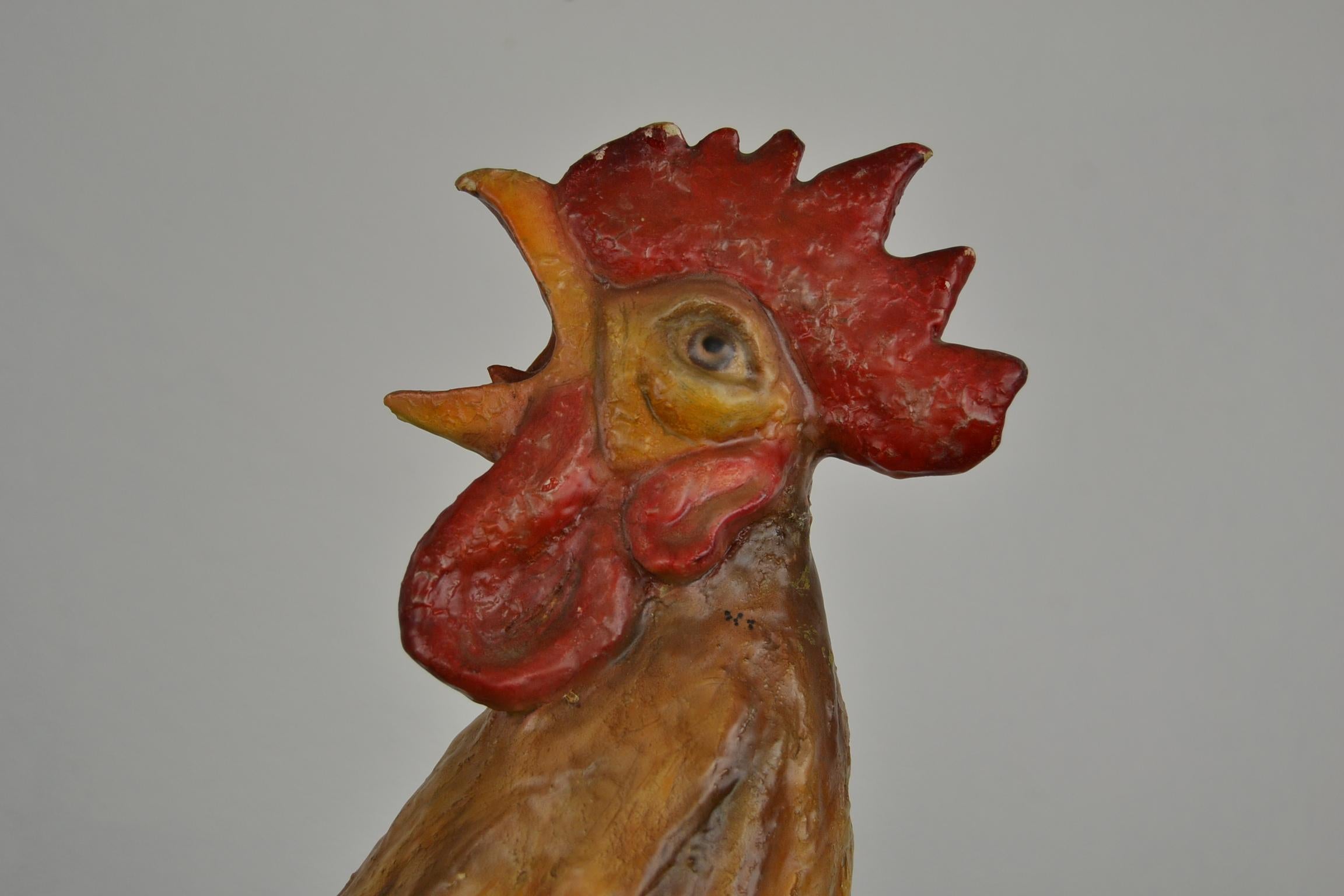 Large vintage paper mache rooster. 
This cock with beautiful red crest is a great decorative object by his size. 
It's an animal sculpture of papier mâché which is very detailed. 
He's also is hand-painted and finished with a kind of gloss layer.