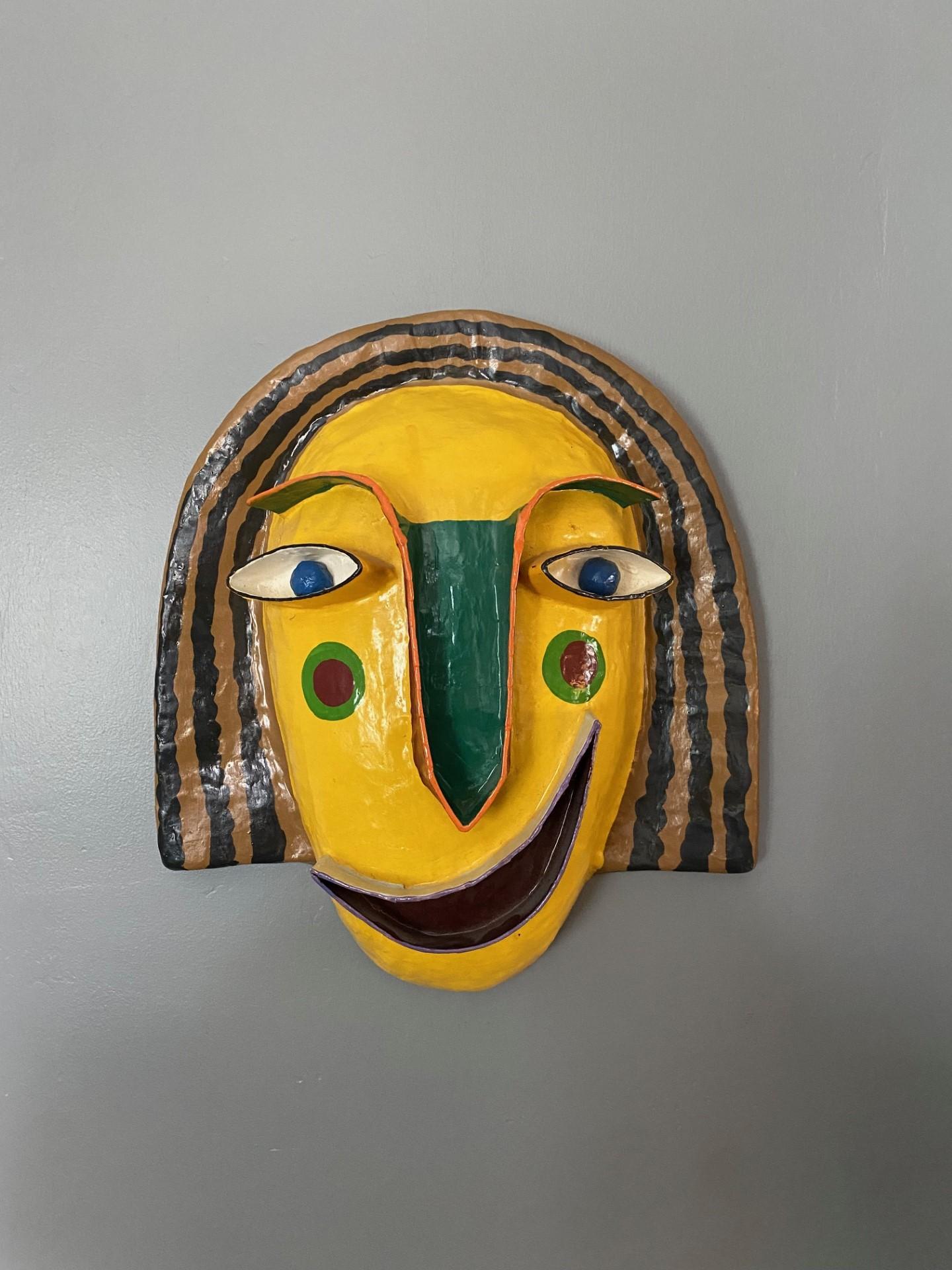 Beautiful and colorful sculpture constructed in papier mache.  This incredible piece is full of expression.  Reminiscent of papier mache sculptures by Sergio Bustamante, this piece blends in with post modern notes in a memphis-like era presence.