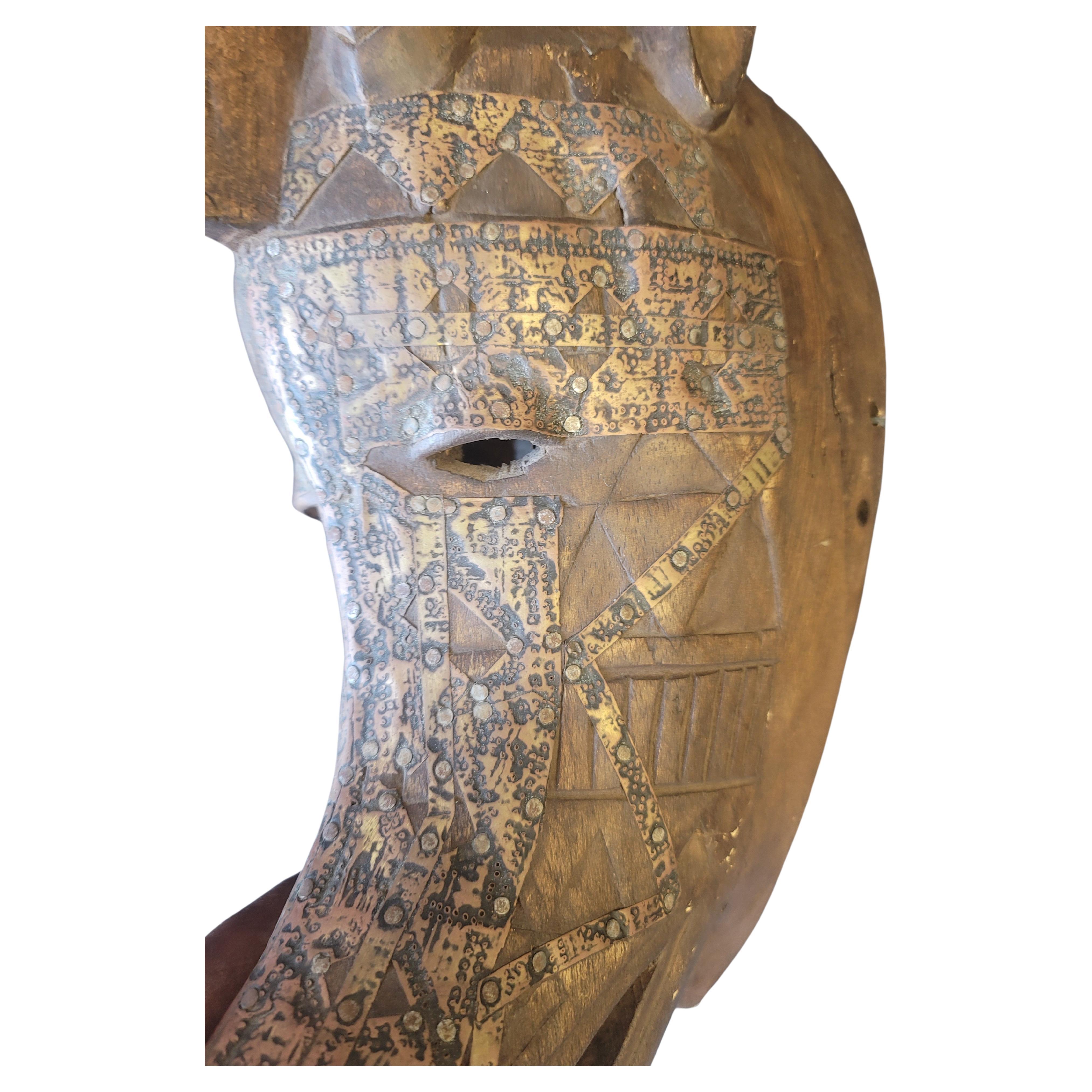 African brass Ornate over wood Totemic sculpture animal in human or vice versa.
Measures: 8