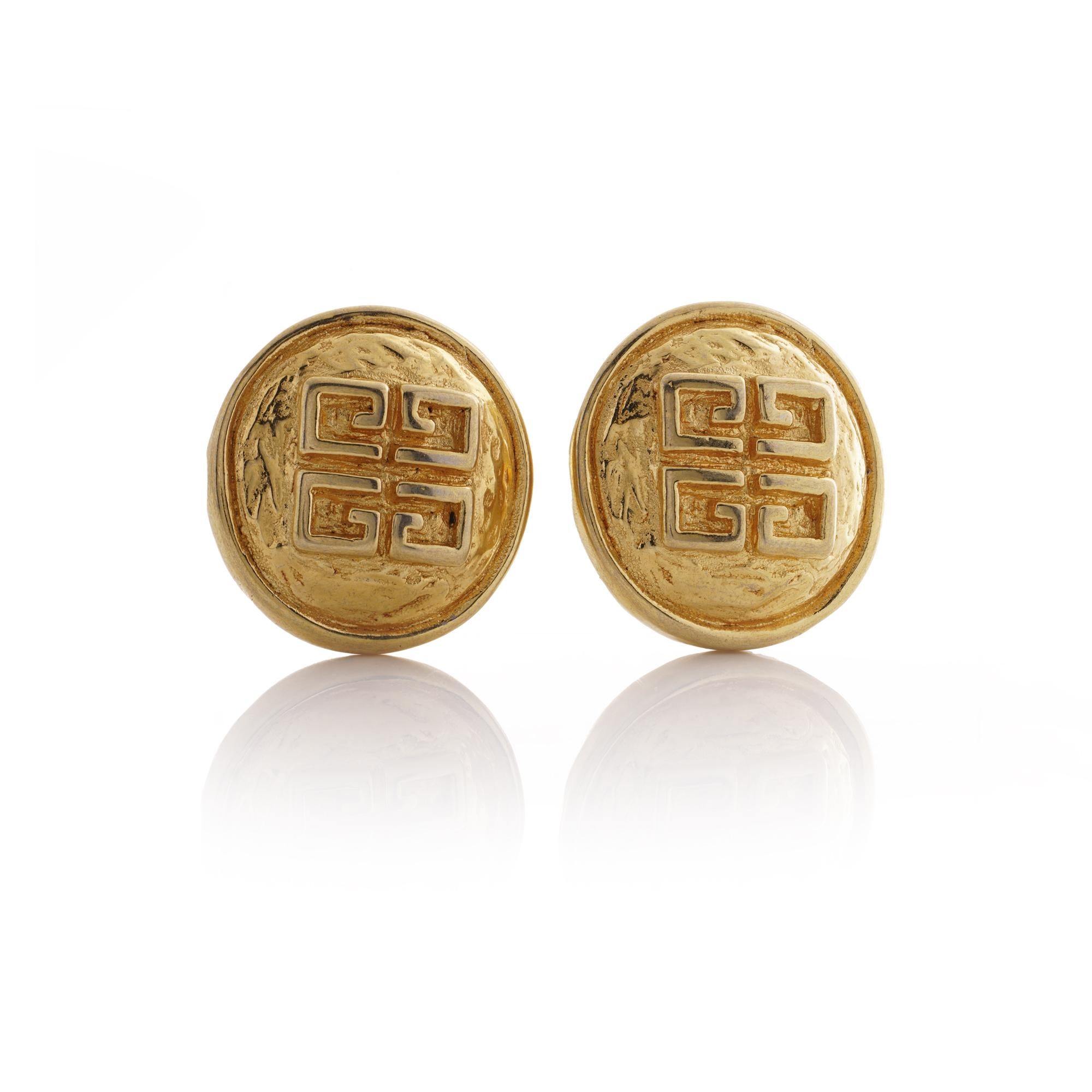 Clip-On Earrings, crafted circa the 1980s, emanating the refined elegance and timeless sophistication associated with the Givenchy brand.

Hailing from the iconic fashion house of Givenchy in France, these earrings bear the esteemed 4G logo,