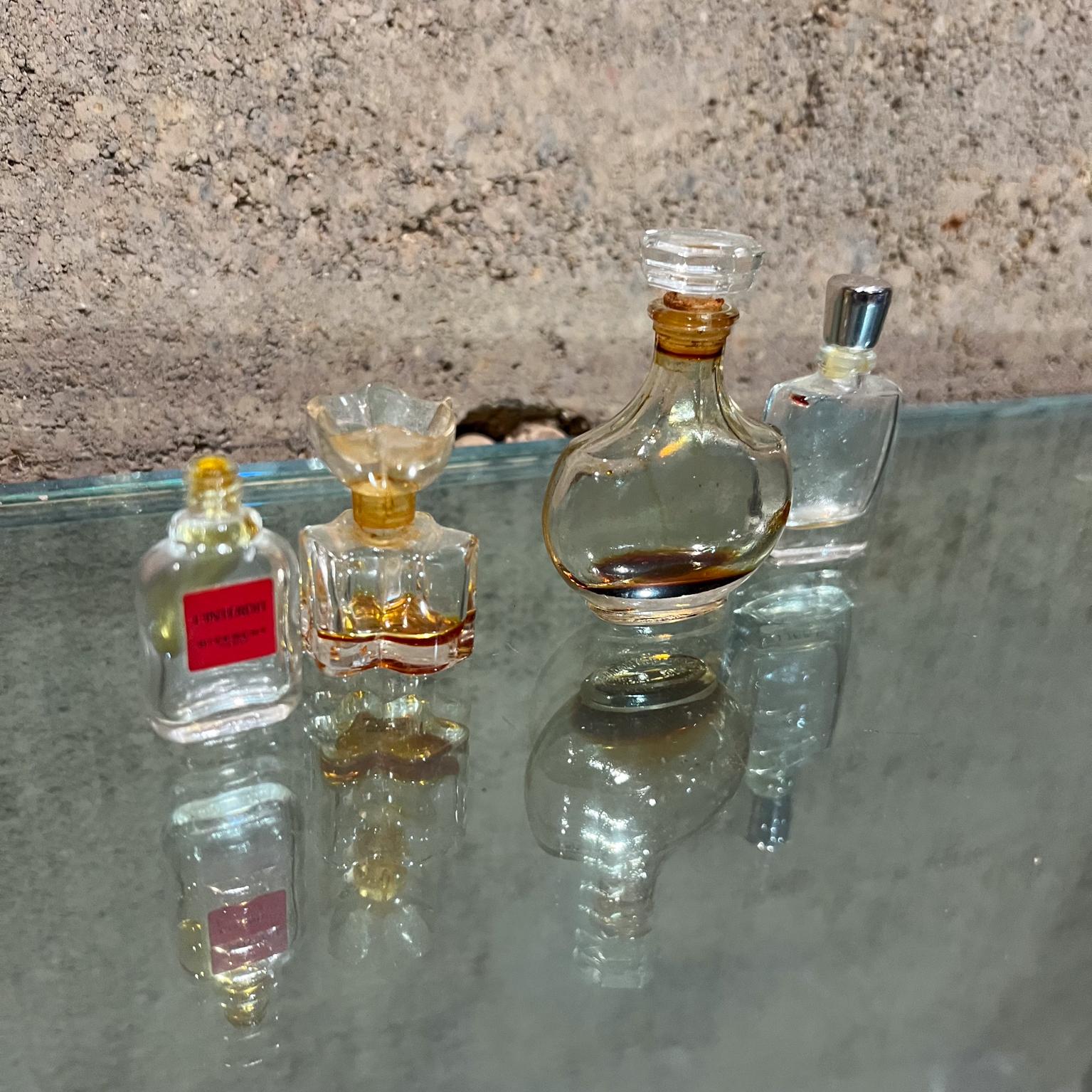 Mid-Century Modern Vintage Paris Vanity Four Miniature Glass Perfume Bottles For Sale