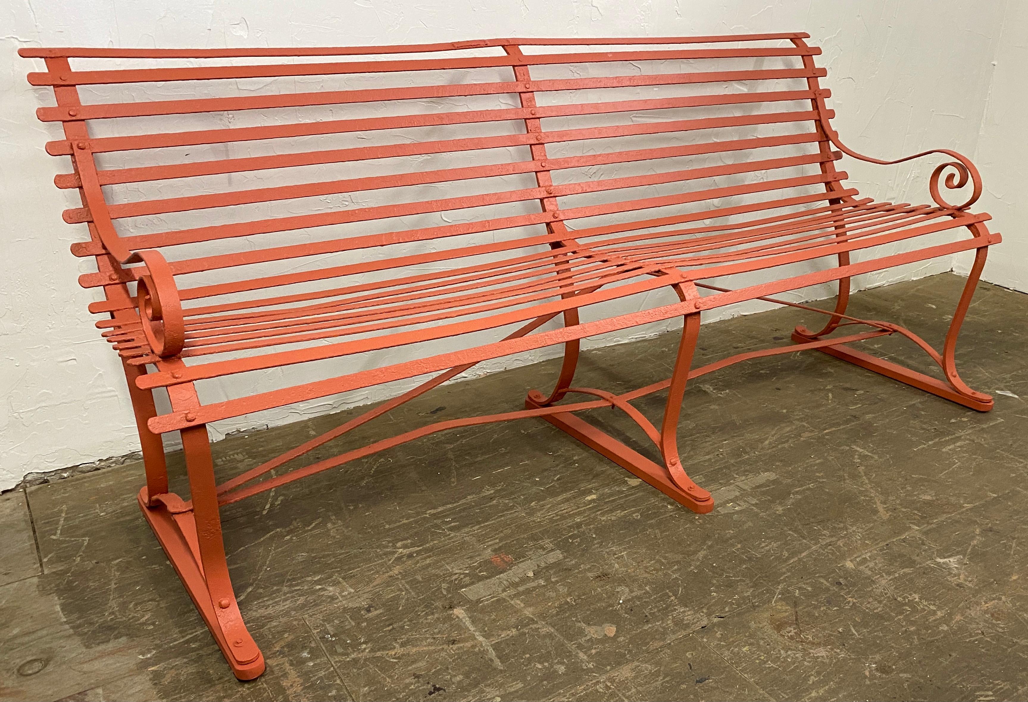 Wrought Iron bench, Stewart iron works, Cincinnati, Ohio. Classical strap metal garden bench with graceful curves made originally for a public park, the bench can grace a private garden just as well.
Measure: Arm H = 23