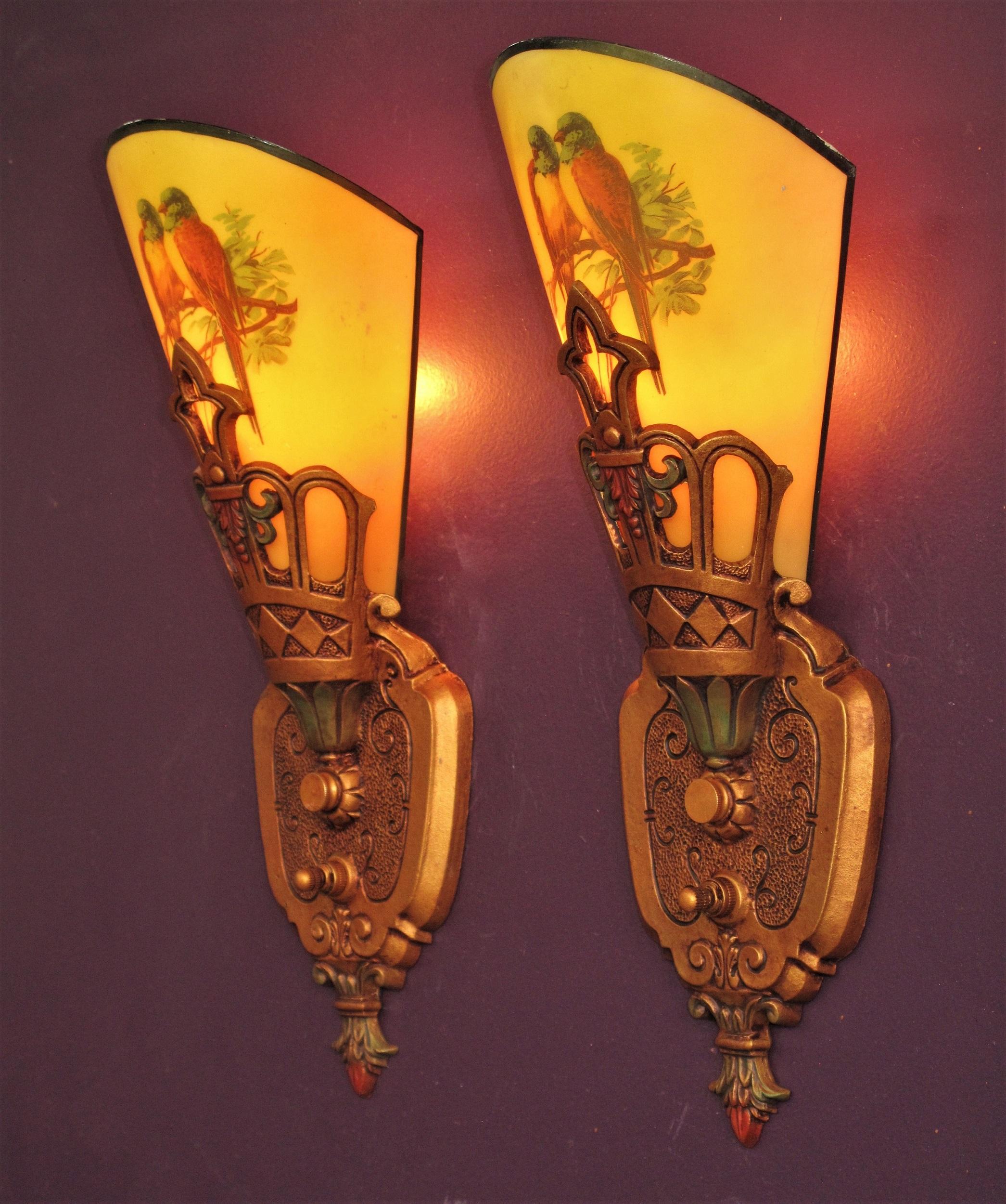 SINGLE ONLY - NOT A SET OF TWO
Love Birds - Vintage pair antique wall sconces with Parrots. Refinished backs to match original colors of light bronze with light green and red highlights. The paint on the slip shades are in remarkable condition for