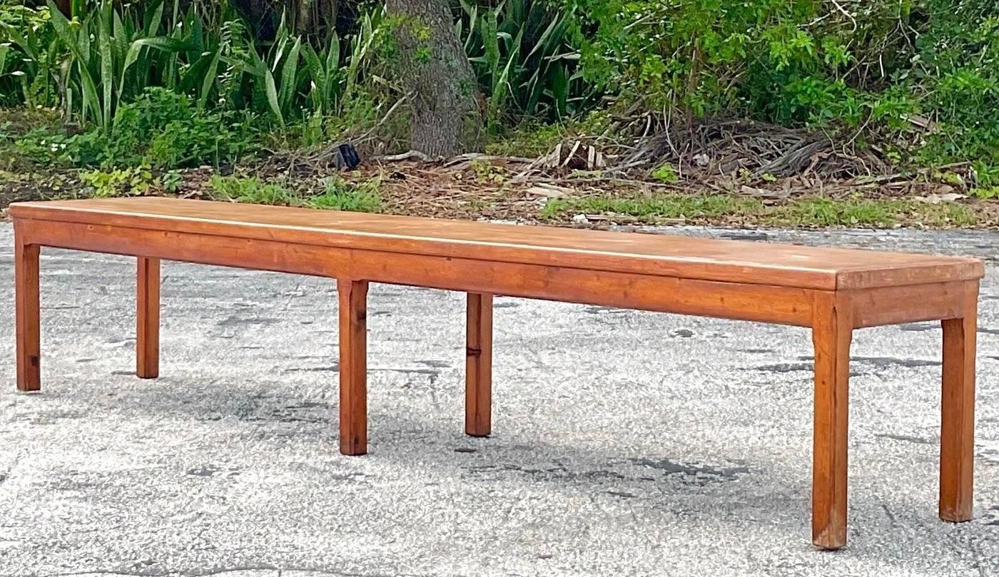 Epic pair of gorgeous wooden benches with Parsons style legs. The rustic assembly and simplicity of design are in fantastic contradiction to the pieces overall scale and grandeur. A chic way to seat all your closest family and friends. Acquired from