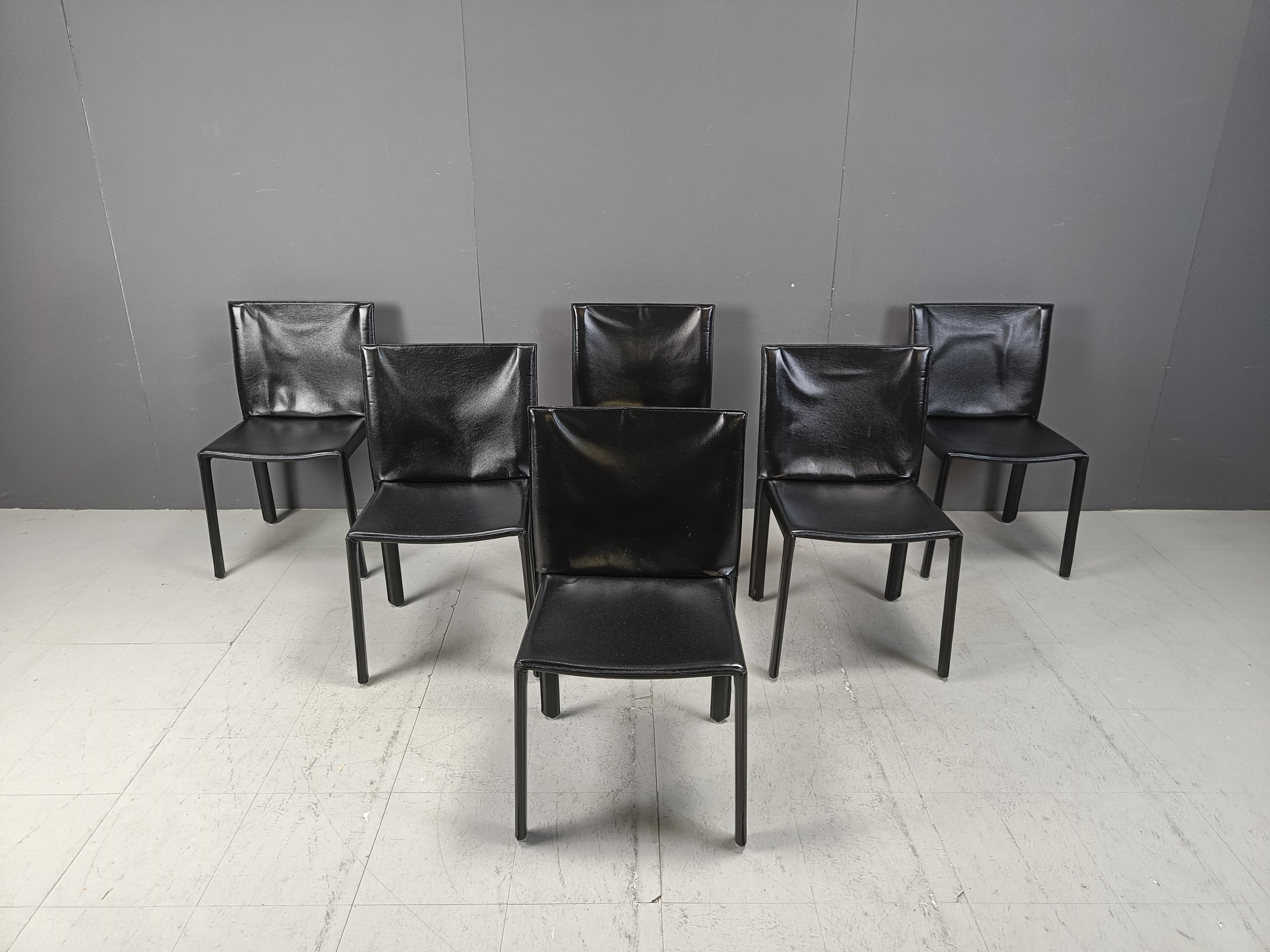 Vintage black leather model 'Pasqualine' dining chairs by enrico Pellizzoni.

Beautiful timeless design with fully stiched leather upholstery.

Very good quality.

Good condition with normal age related wear.

Chairs are labelled at the