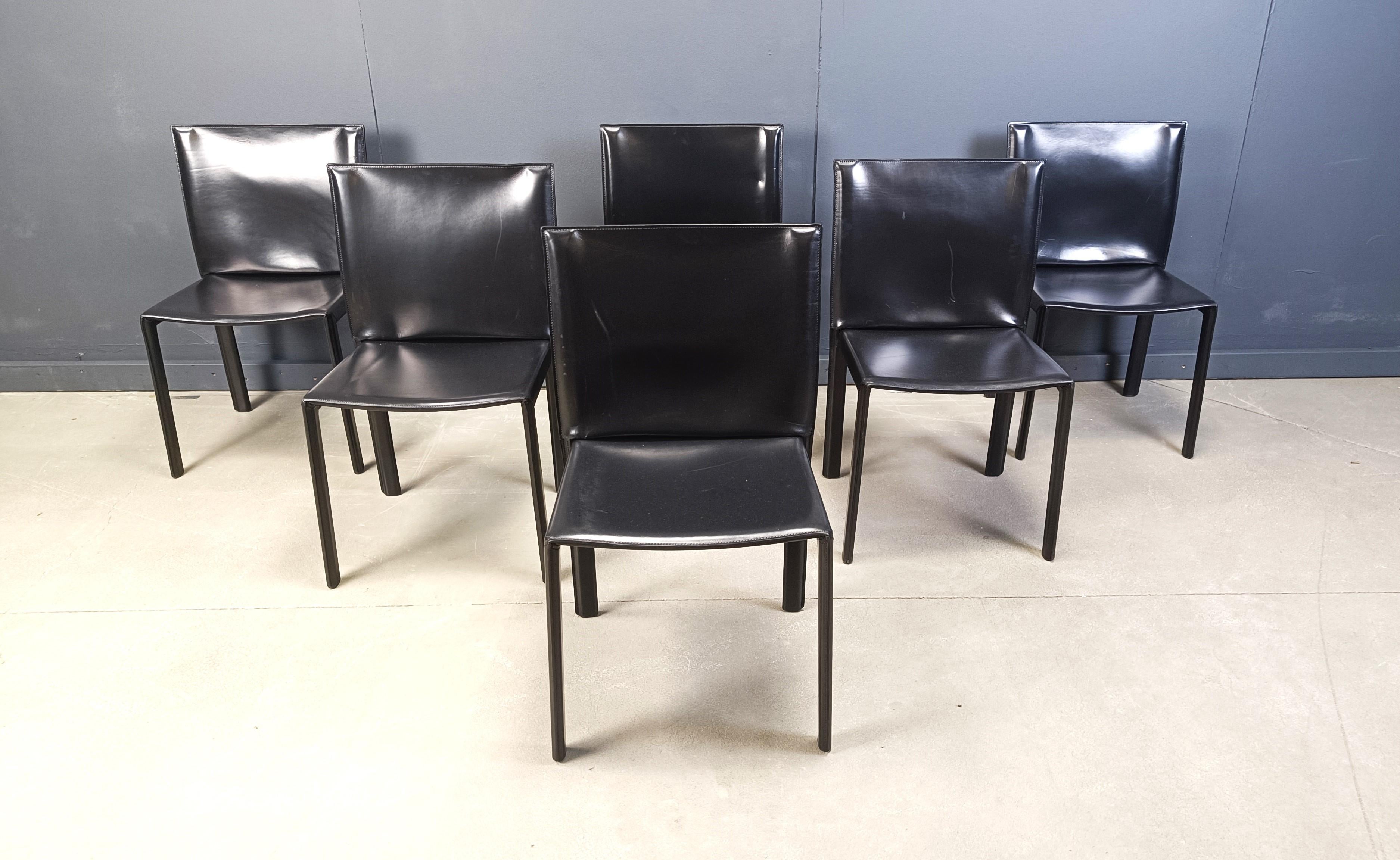 Vintage black leather model 'Pasqualine' dining chairs by enrico Pellizzoni.

Beautiful timeless design with fully stiched leather upholstery.

Very good quality.

Good condition with normal age related wear.

Chairs are labelled at the
