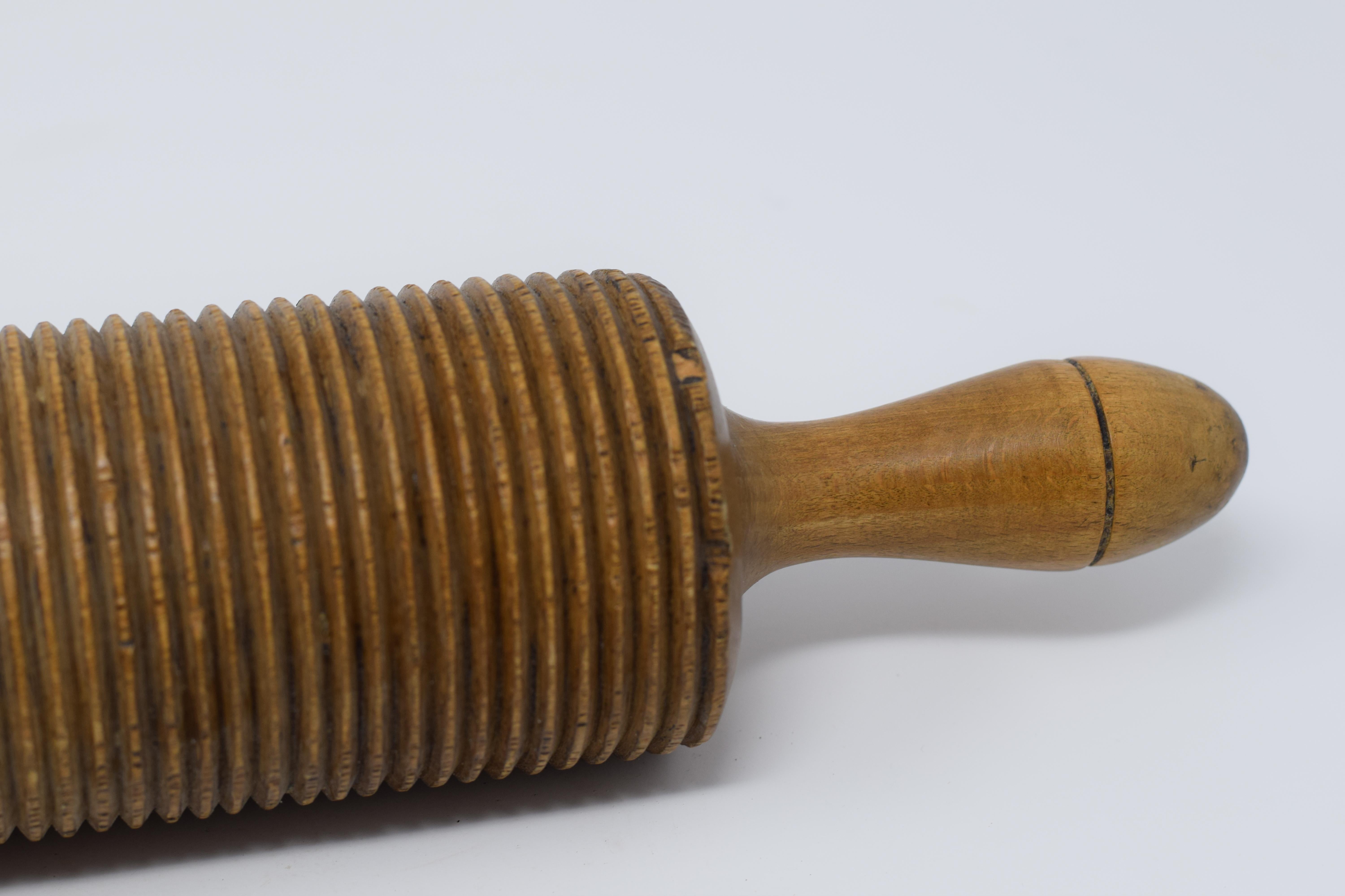 vintage rolling pin with grooves