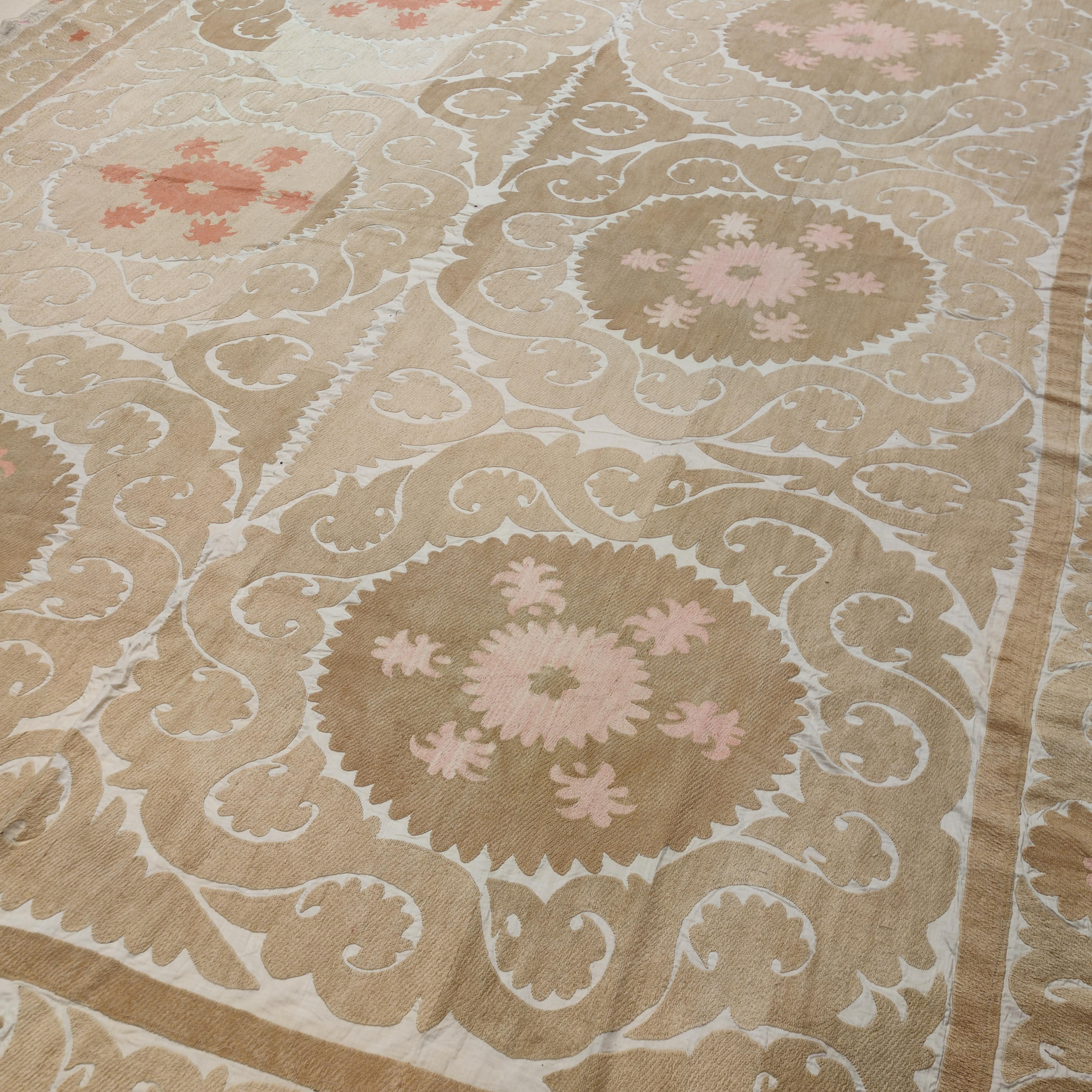 The Suzani textiles from Uzbekistan represent the most refined and elegant manifestation of the Central Asian textile art tradition. Exquisite embroideries such as this one were woven by young women in order to enrich their dowry, which is why they