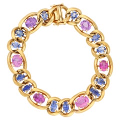 Gliederarmband aus 18 Karat Gelbgold mit pastellfarbenem, rosa und blauem Saphir