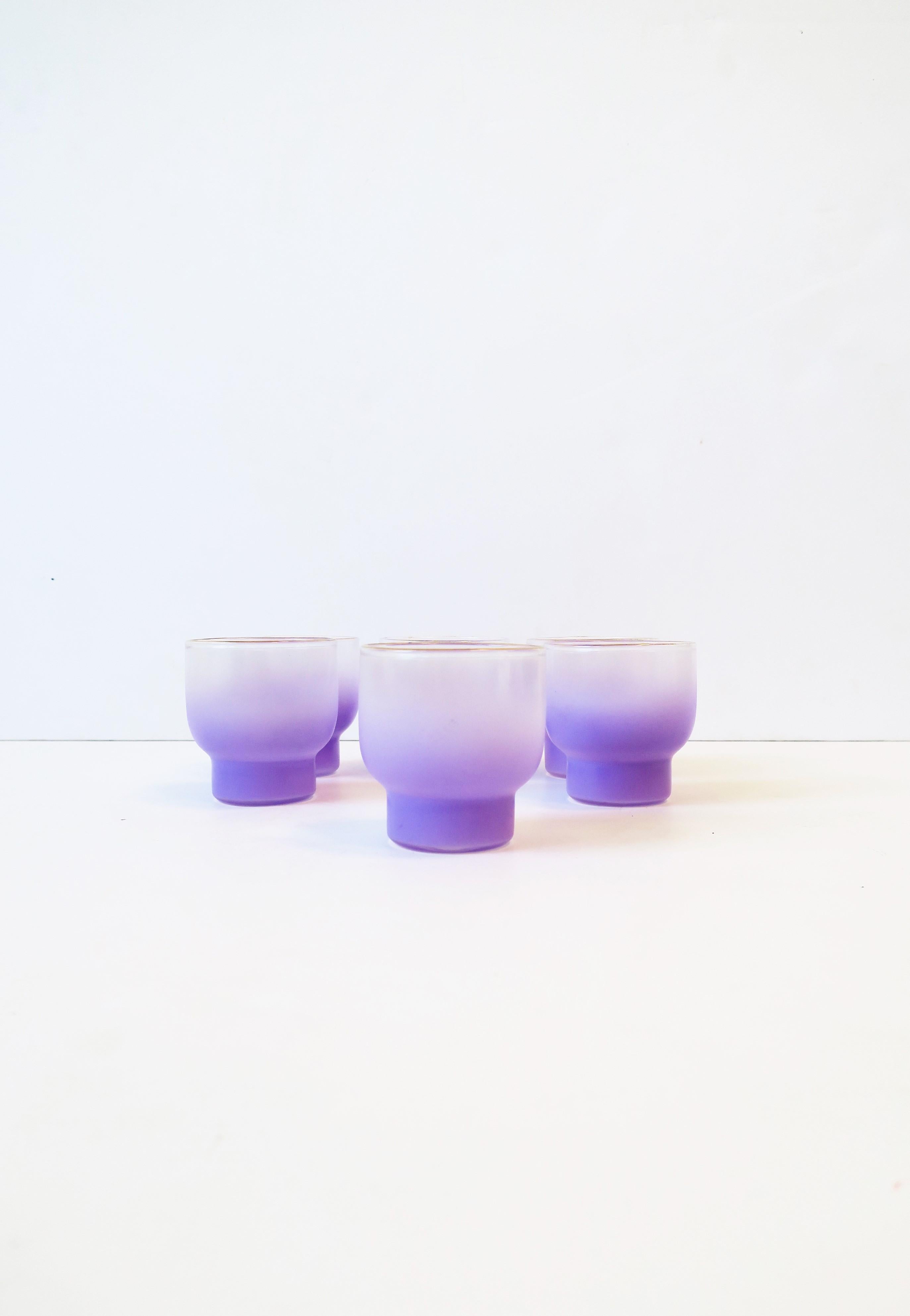 A set of six (6) vintage pastel purple lavender cocktail rocks' glasses, circa mid-20th century, 1960s, USA. Glass has a recessed base and a touch of gold detail around rim. A great set for any bar, bar cart, summer and holiday entertaining, etc.