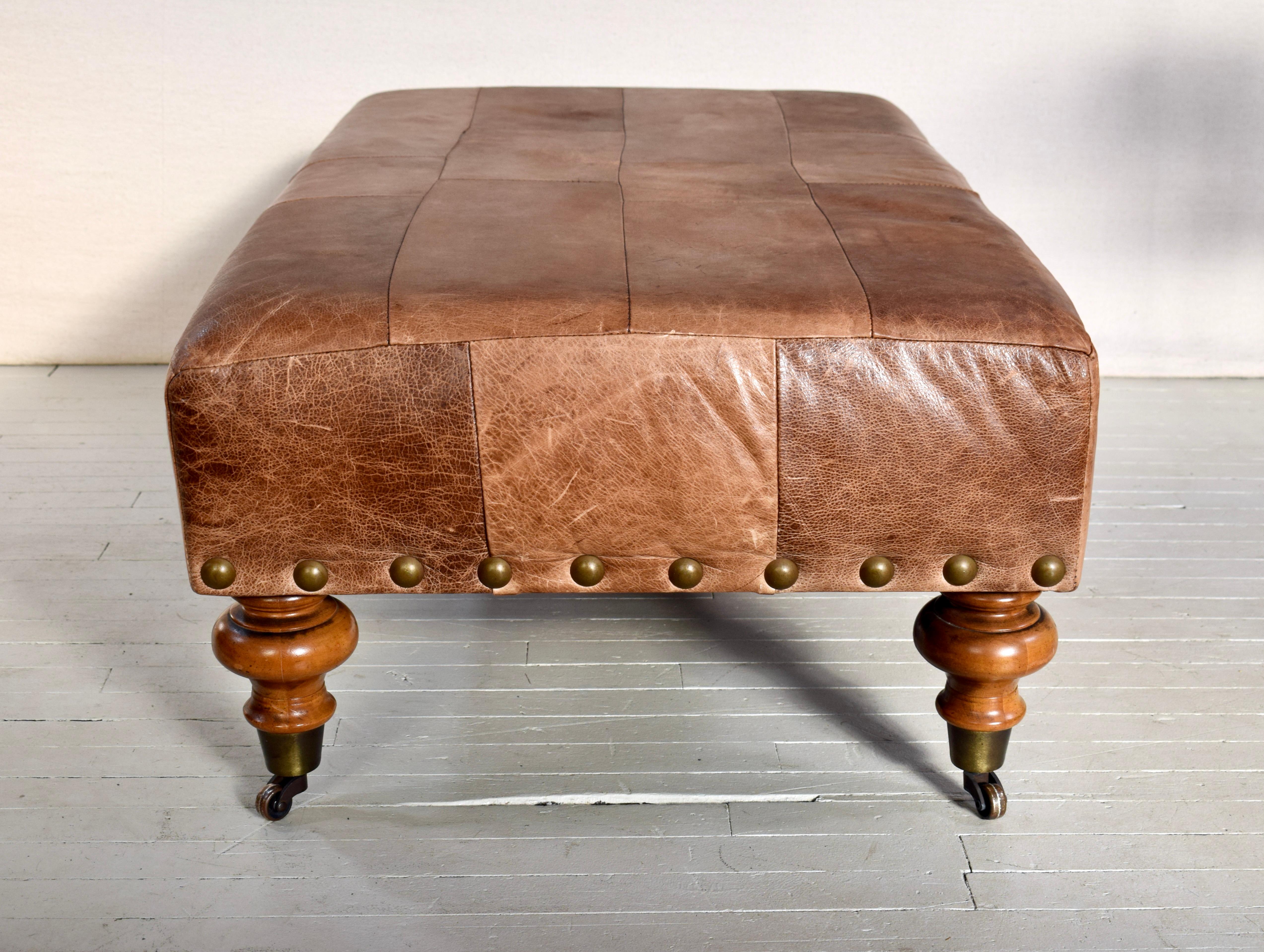 Late 20th Century Vintage Patchwork Leather Ottoman on Casters