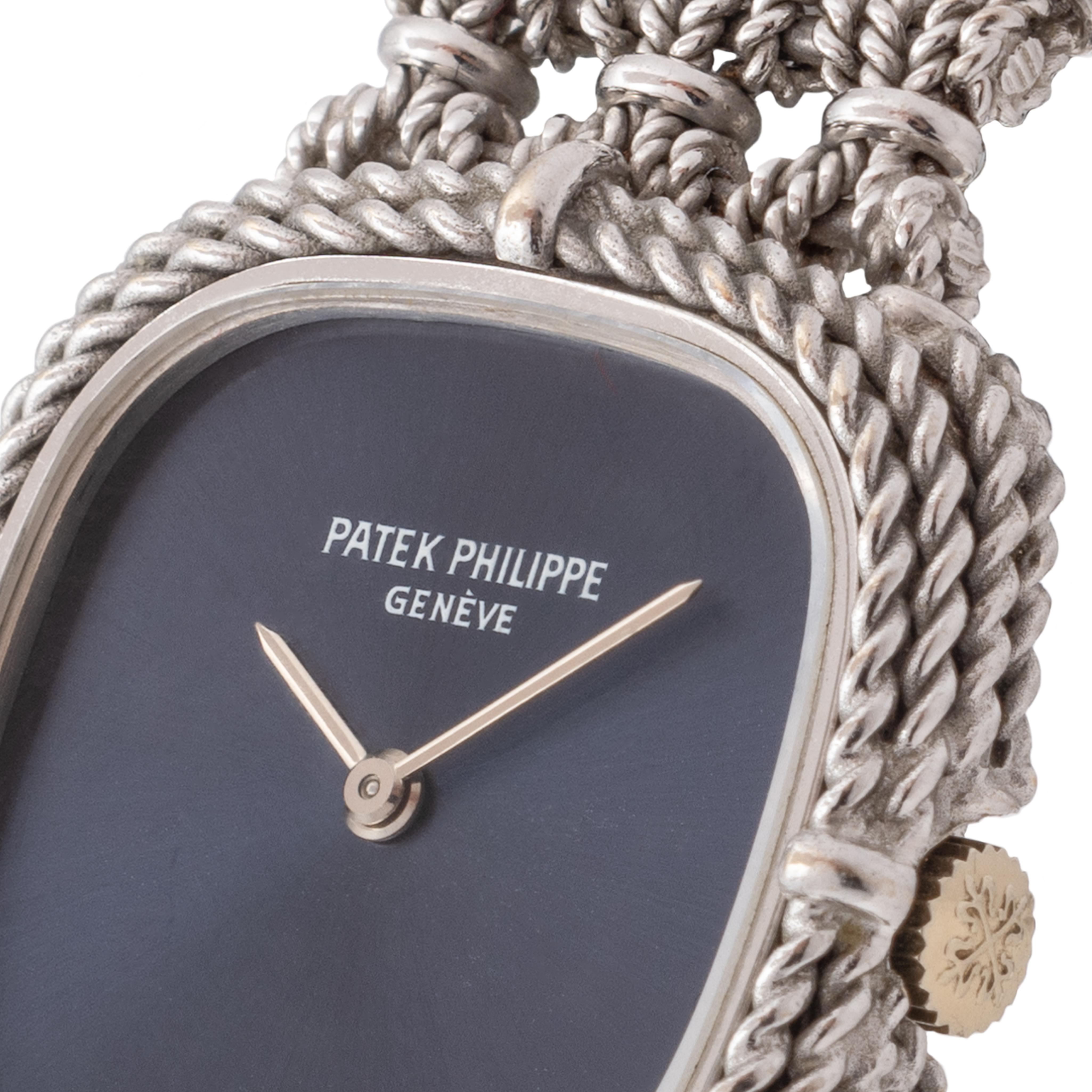 Vintage Patek Philippe 18 Karat White Gold Ellipse Model 4265 Manual Wind Watch 1