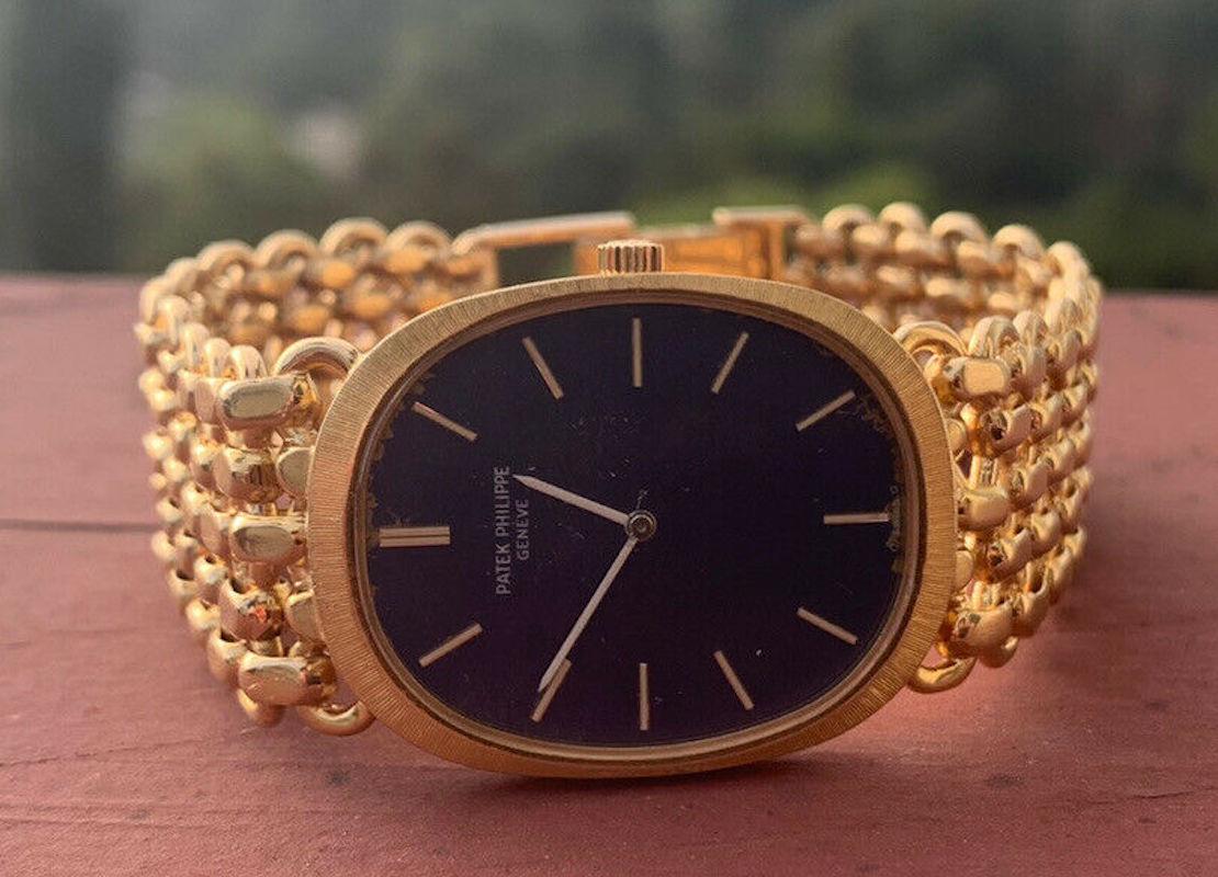 Vintage Patek Philippe Ellipse 3577/1 18K Yellow Gold Watch 84g

Brand	Patek Philippe
Ref #	3577/1
Dial.   Blue
Case Material	18k Yellow Gold
Case Size	33 x 25 mm
Bracelet	18k gold
Movement	Manual
Box/ Papers     No
Notes   Watch is 100% original,