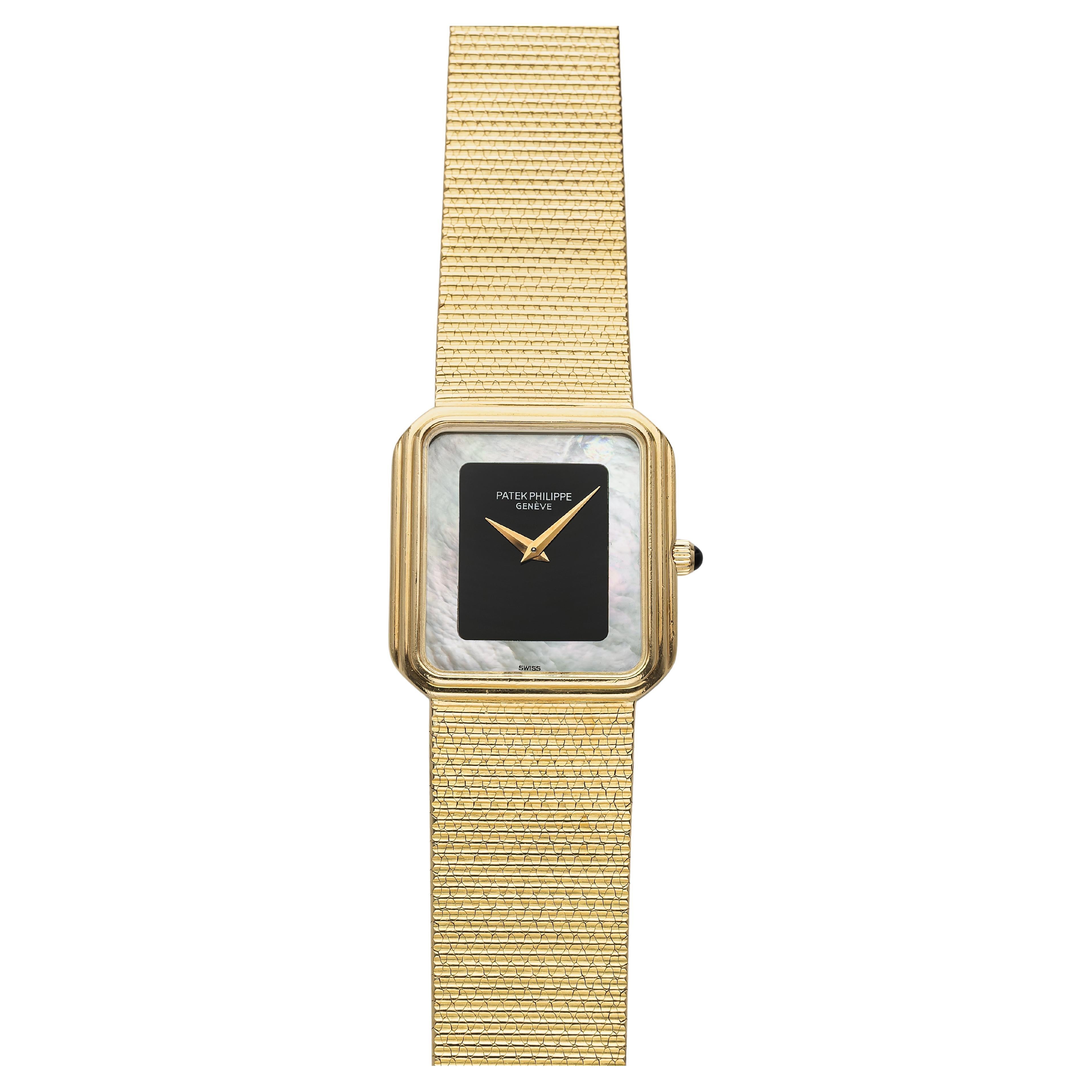 Vintage Patek Philippe 80s 18K Yellow Gold Onyx 
Mother of Pearl Dial Manual For Sale