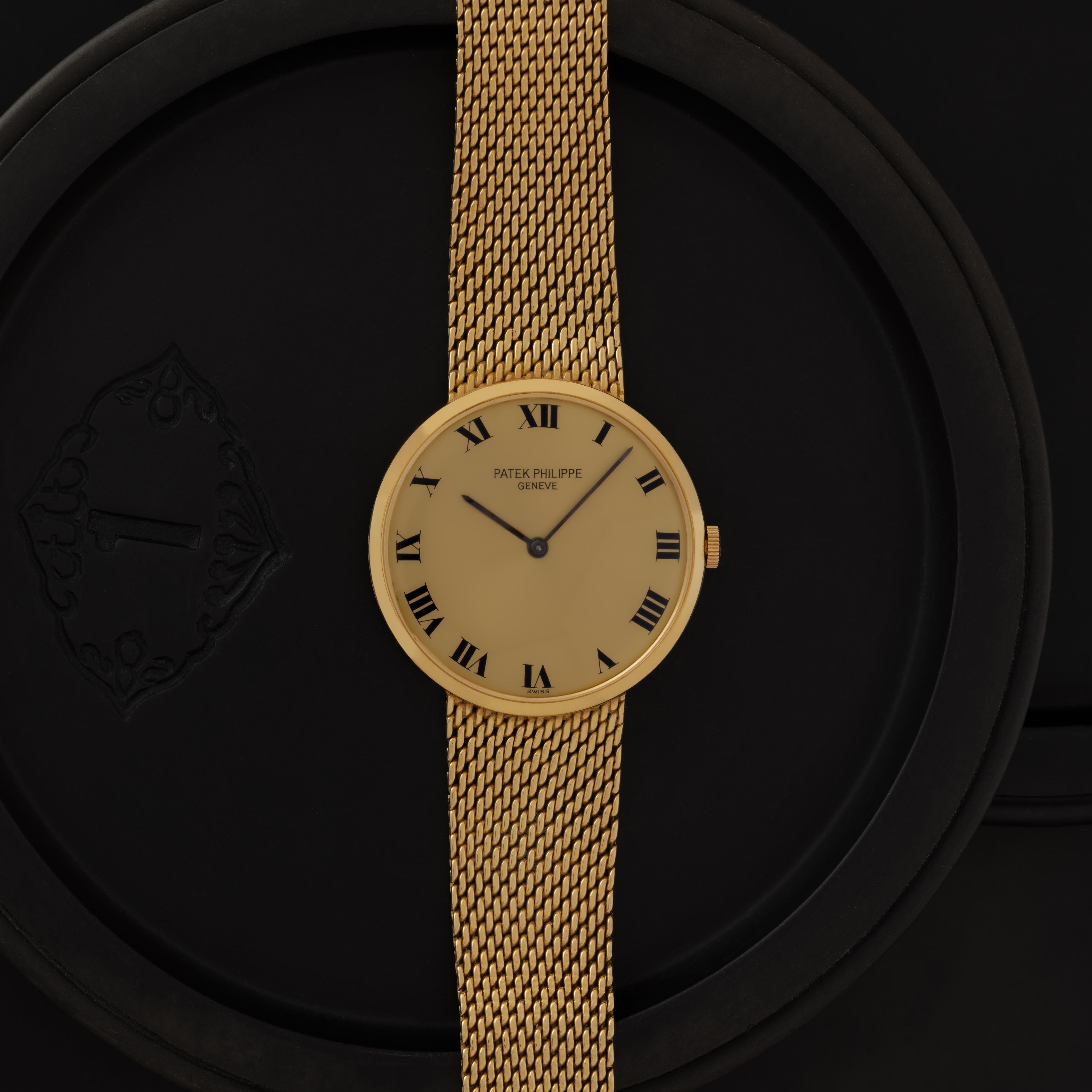Maker: Patek Philippe
Model: Calatrava 3562
Year: 1960s
Material: 18k Yellow Gold
Dial: 33mm Gold Dial with Roman Numerals
Case Measurement: --mm
Movement: Manual Wind
Condition: Very good vintage condition
Weight: 79 Grams
Size: Adjustable, Fits Up