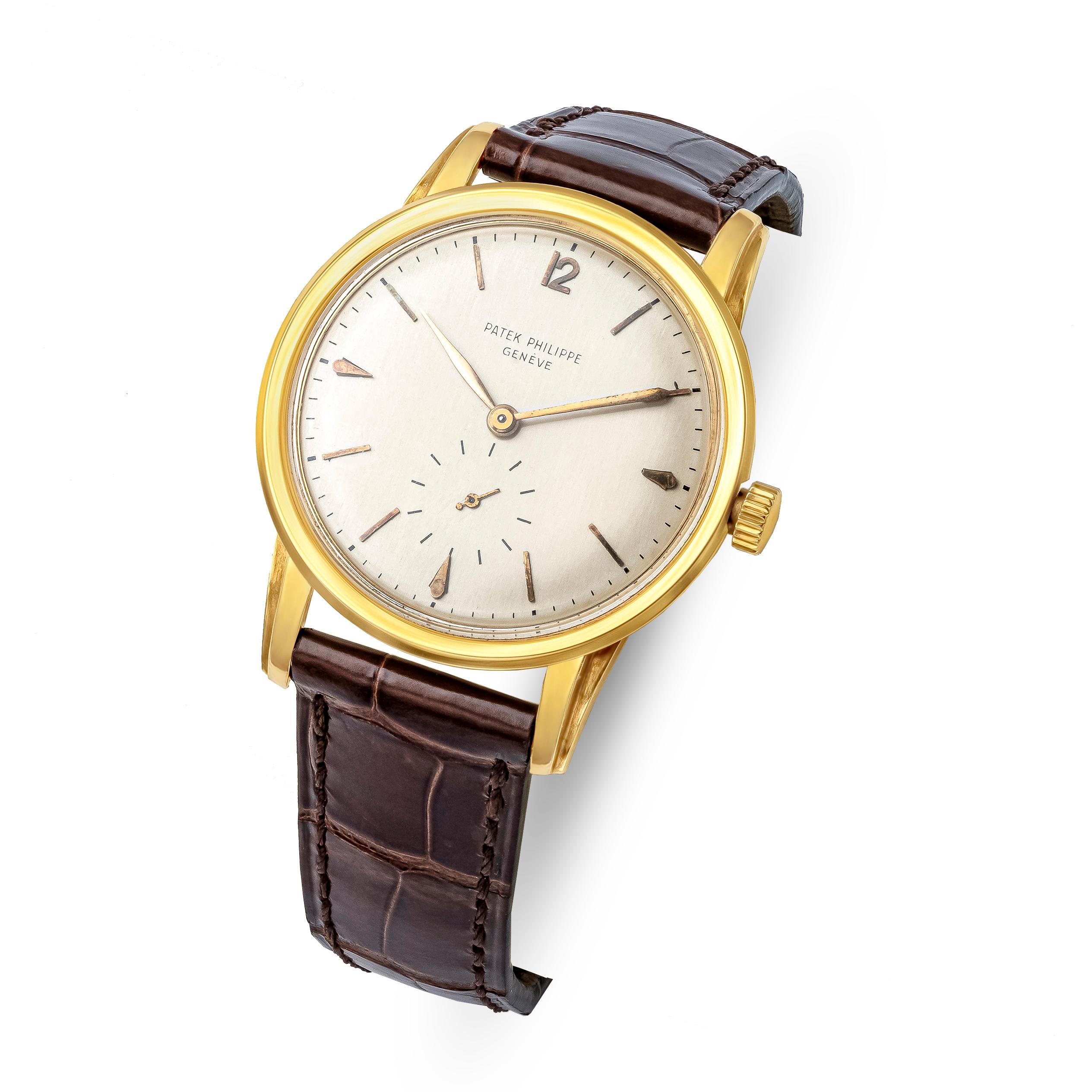 A vintage and classic Patek Philippe watch. Calatrava model. 35mm case diameter made in 18k yellow gold.
Ref 2452J with a 10-200 Caliber Movement. This movement was fitted to this model watch made in 1949 - 1951.
Silver white dial with gold hour