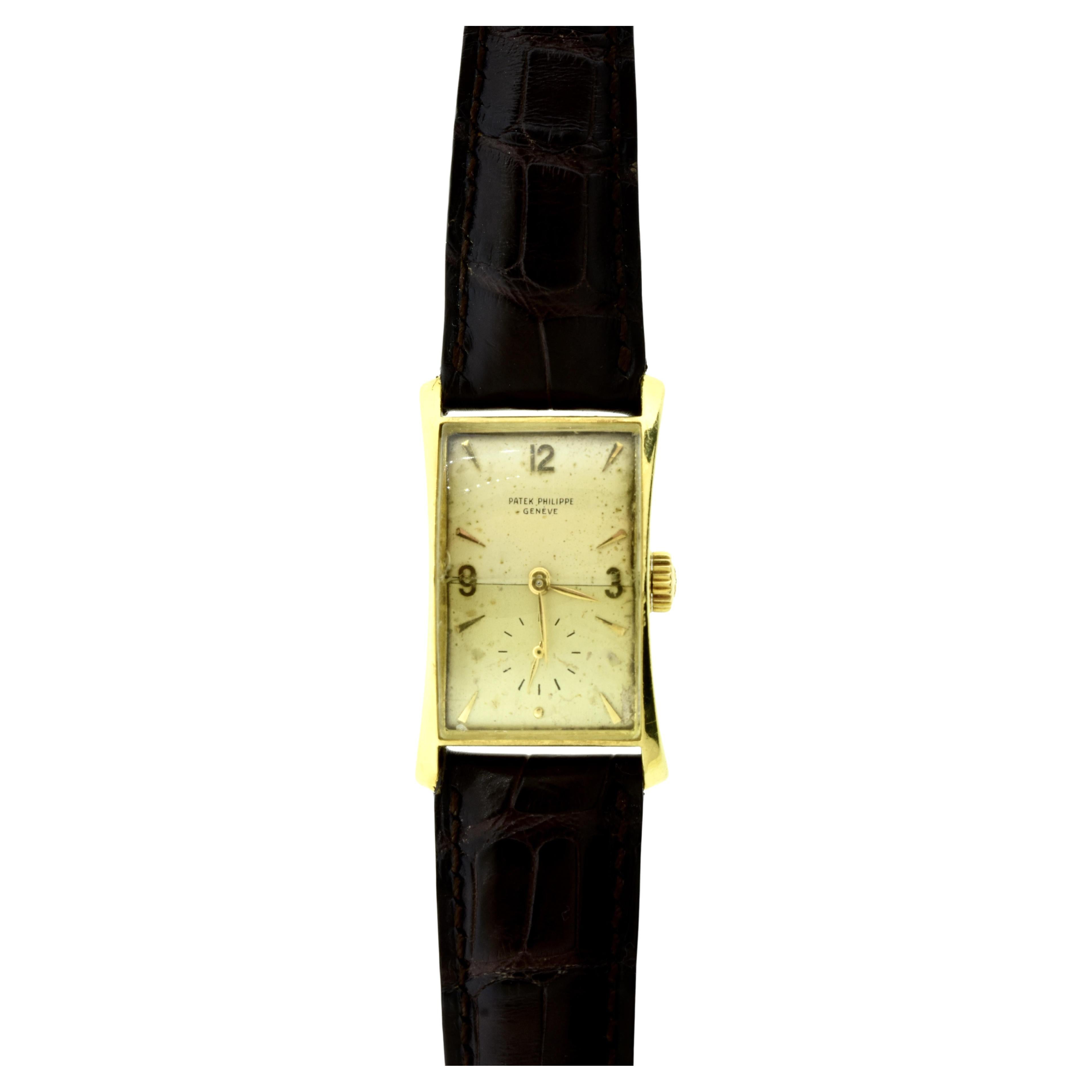 Vintage Patek Philippe "Hourglass" 18K Yellow Gold Wristwatch. c. 1948.